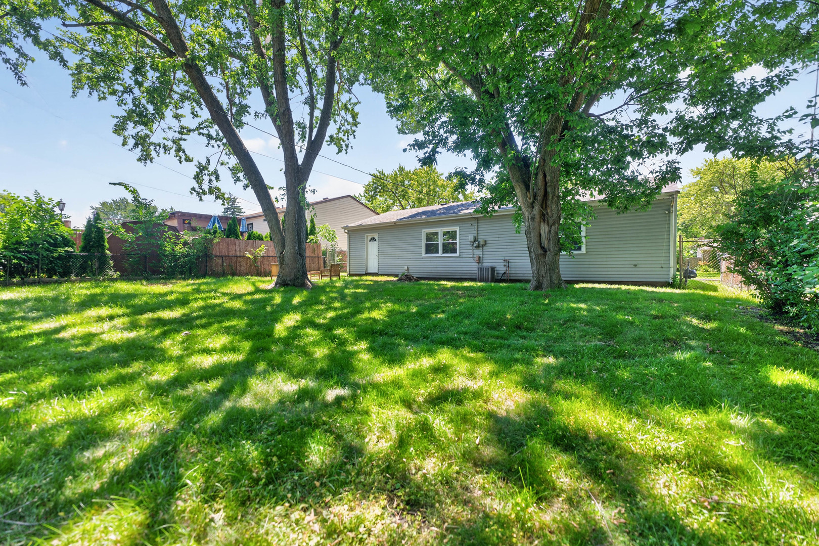 103 Willow Road Streamwood, IL 60107 - Photo 17 of 17 a view of a house with a yard