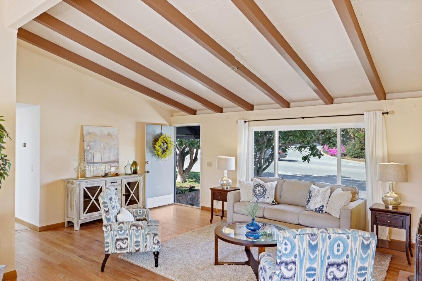 3420 Rio Road Carmel, CA 93923 - Photo 3 of 29 a living room with furniture and rug