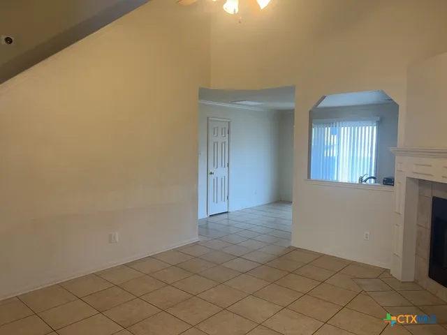 a view of an empty room and window