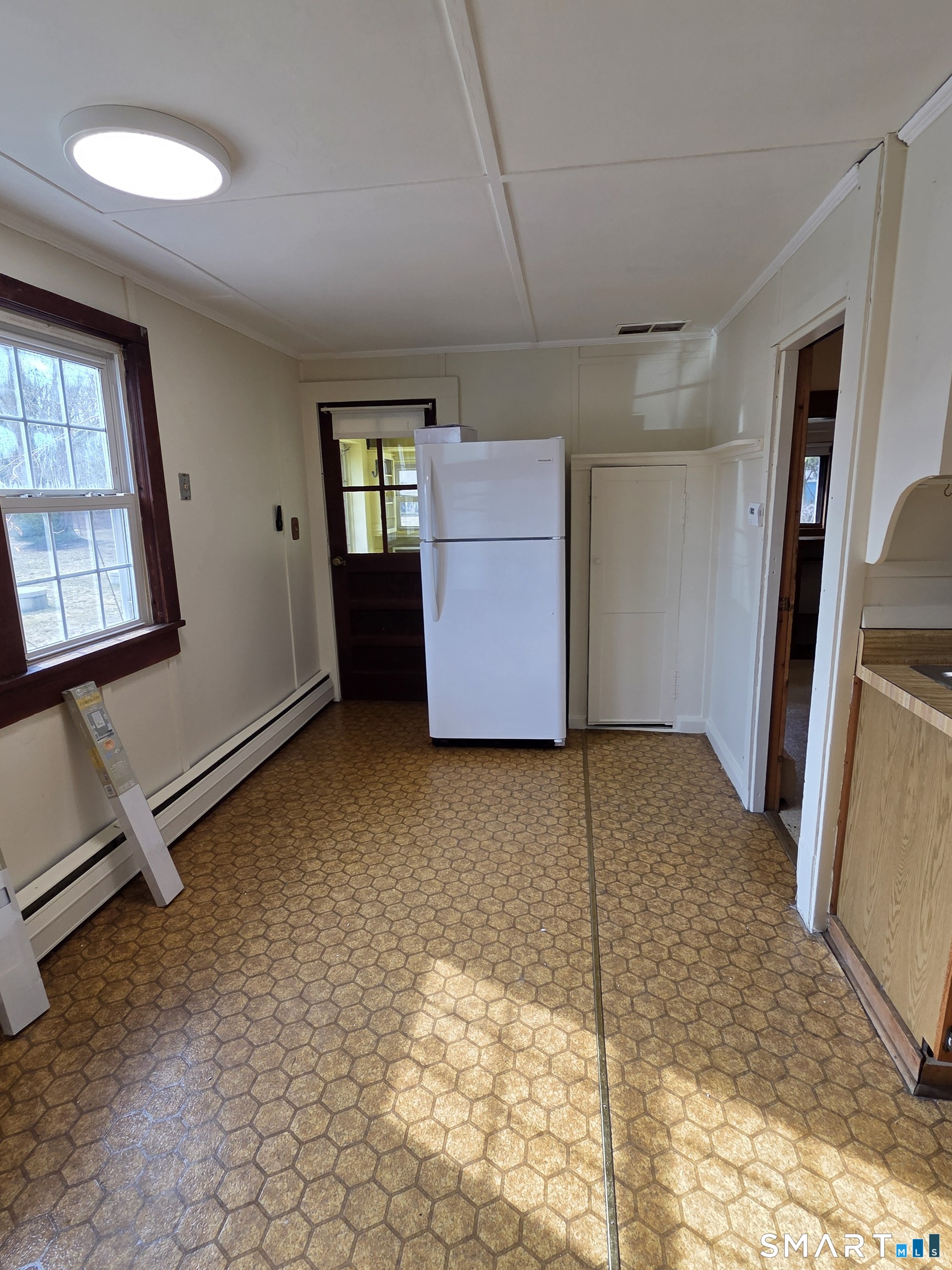 397 Buddington Road Groton, CT 06340 - Photo 8 of 13 a view of a storage & utility room
