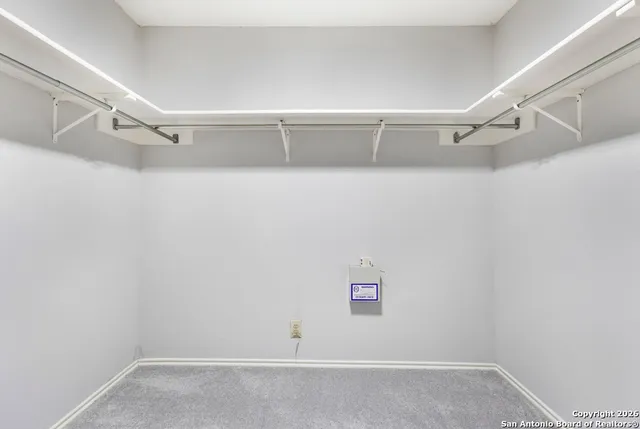 a view of a room with racks on the wall