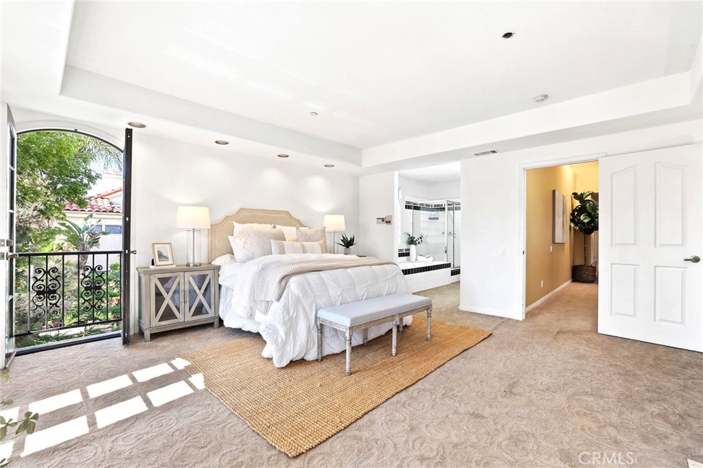 247 6th Street Seal Beach, CA 90740 - Photo 23 of 39 a bed room with a bed and a large window