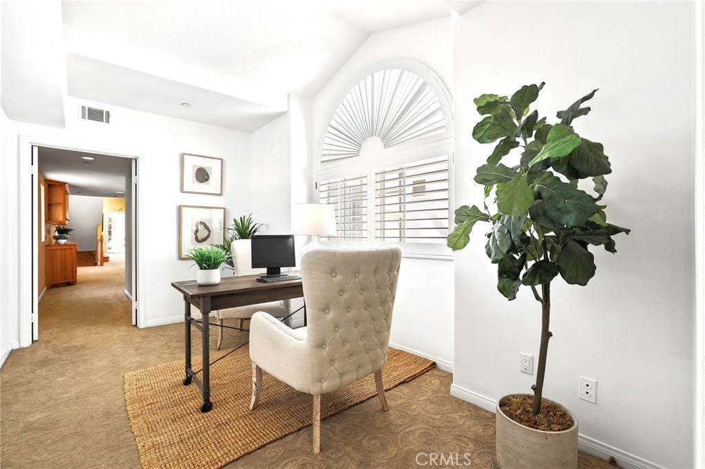 247 6th Street Seal Beach, CA 90740 - Photo 30 of 39 a dining room with furniture and a potted plant