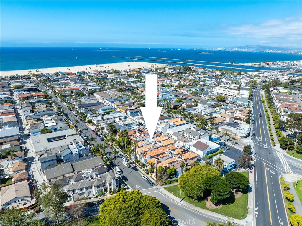 247 6th Street Seal Beach, CA 90740 - Photo 4 of 39 an aerial view of a city with ocean view
