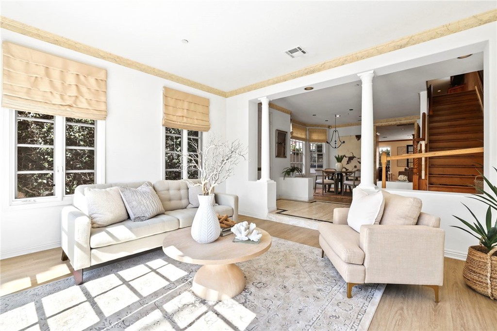 247 6th Street Seal Beach, CA 90740 - Photo 8 of 39 a living room with furniture and a large window