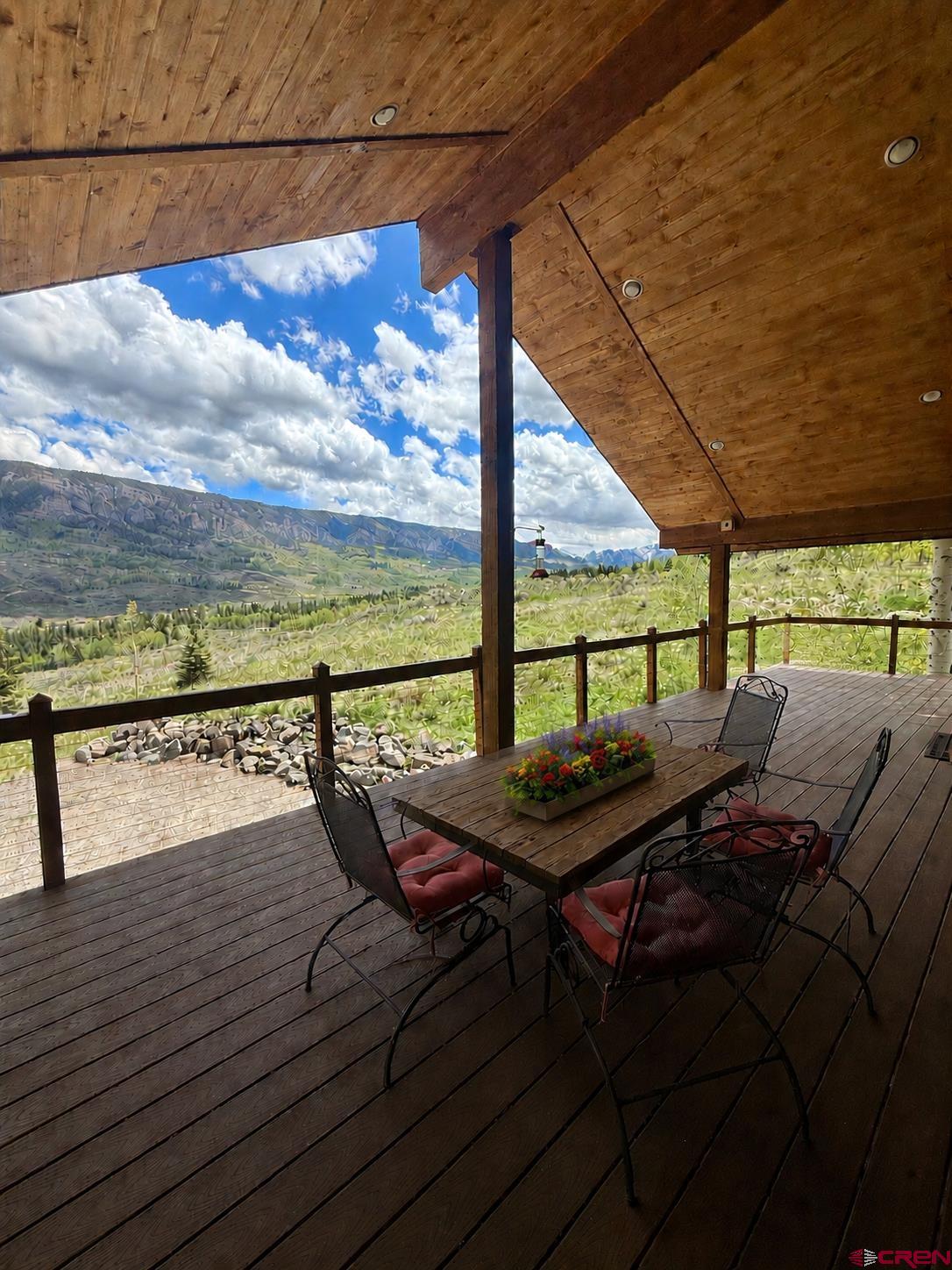 684 Falcon Way Montrose, CO 81403 - Photo 32 of 43 a view of a balcony with lake view and a potted plant