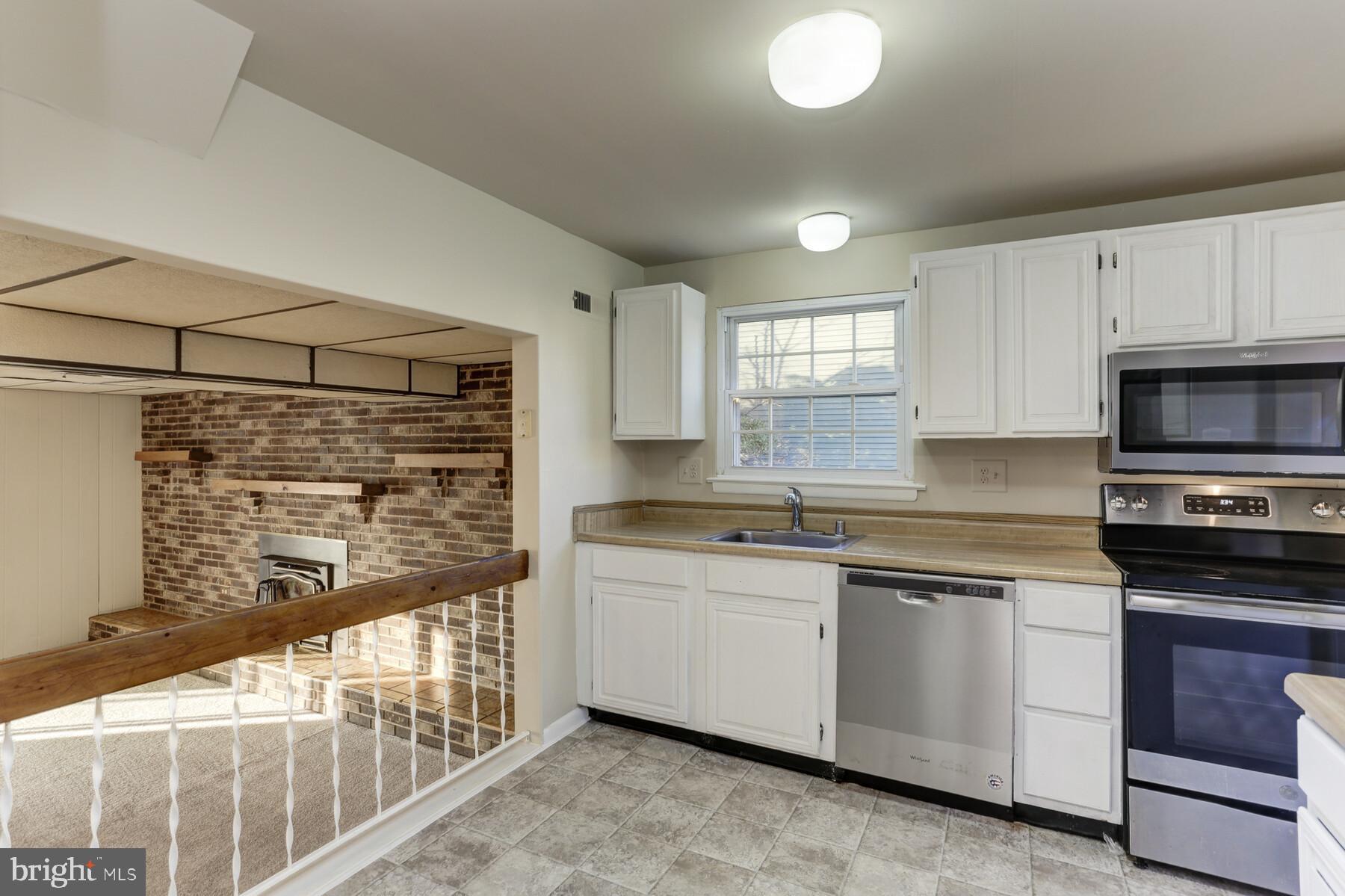 5404 Balistan Road Baltimore, MD 21237 - Photo 8 of 25 Kitchen overlooks Family Room