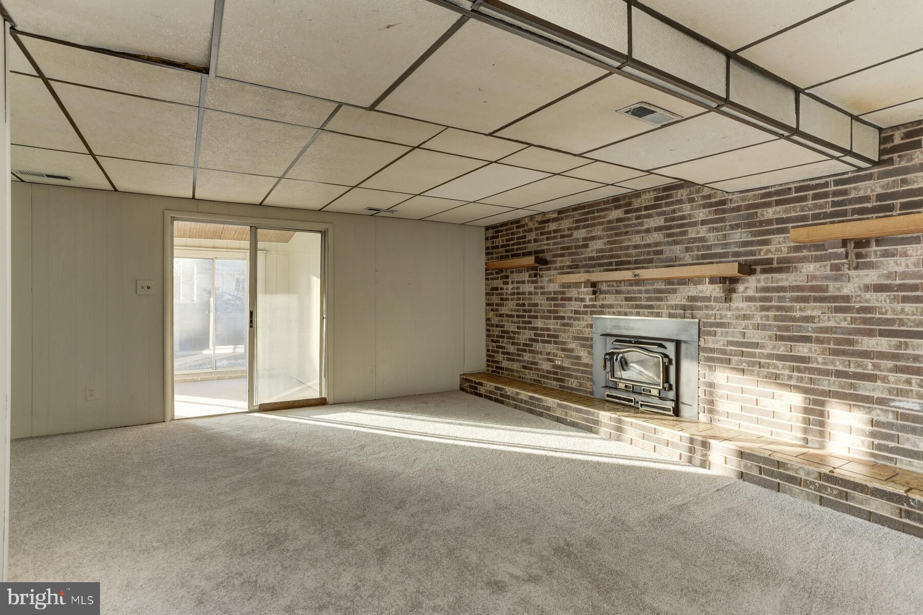 5404 Balistan Road Baltimore, MD 21237 - Photo 9 of 25 Family Room w/ fresh paint and carpet