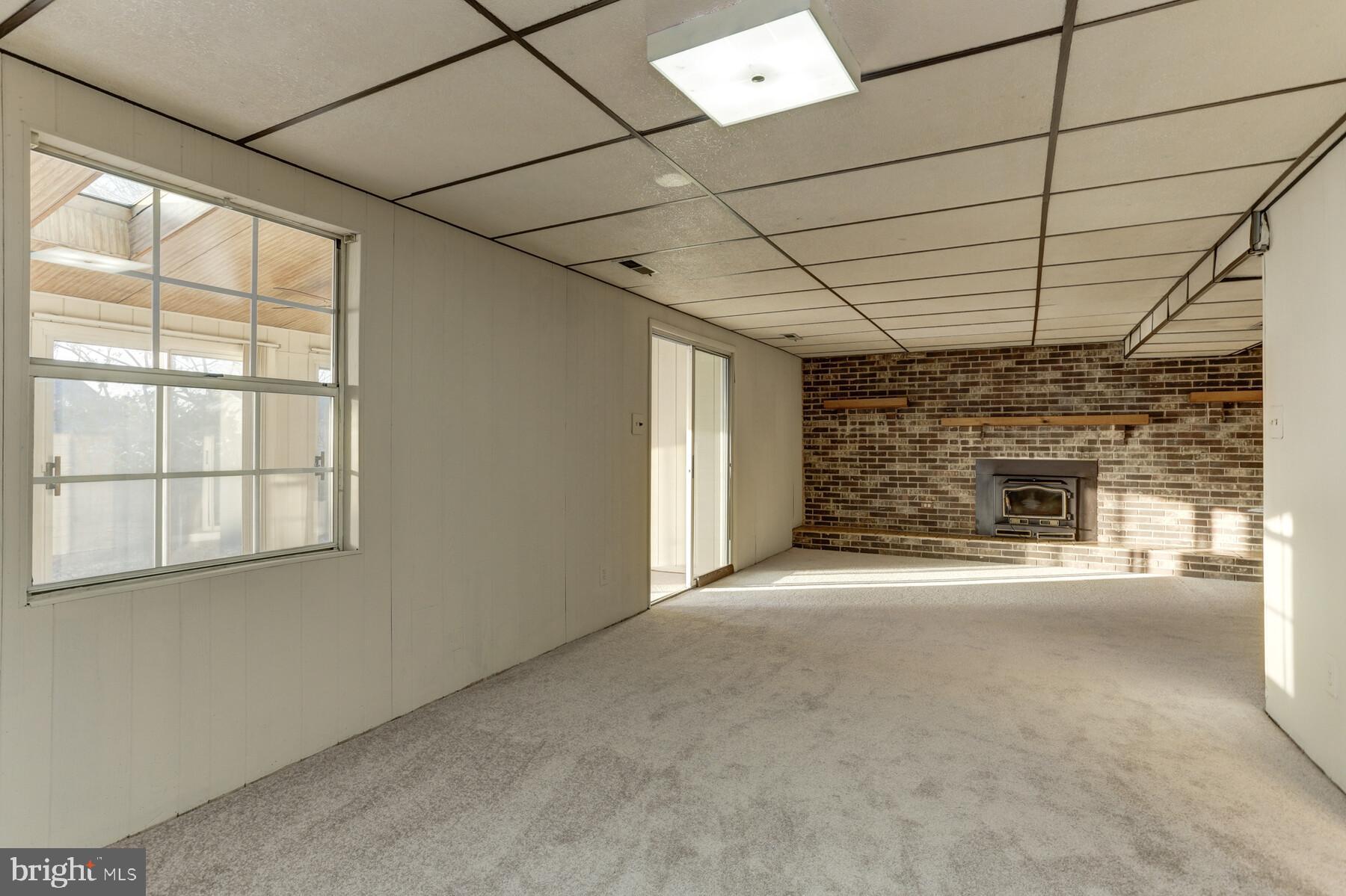 5404 Balistan Road Baltimore, MD 21237 - Photo 10 of 25 Huge Family Room with Wood Burning Fireplace