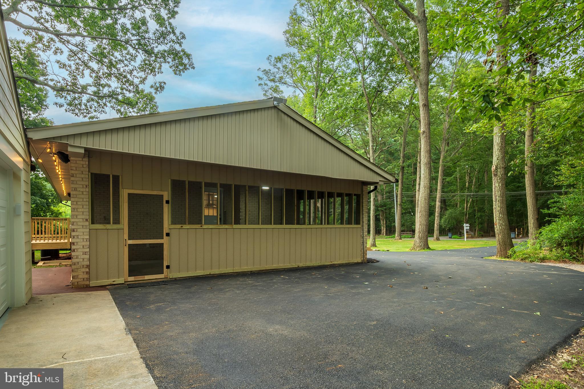 16480 Ed Warfield Road Woodbine, MD 21797 - Photo 5 of 59 Exterior Side / Screened In Porch Side
