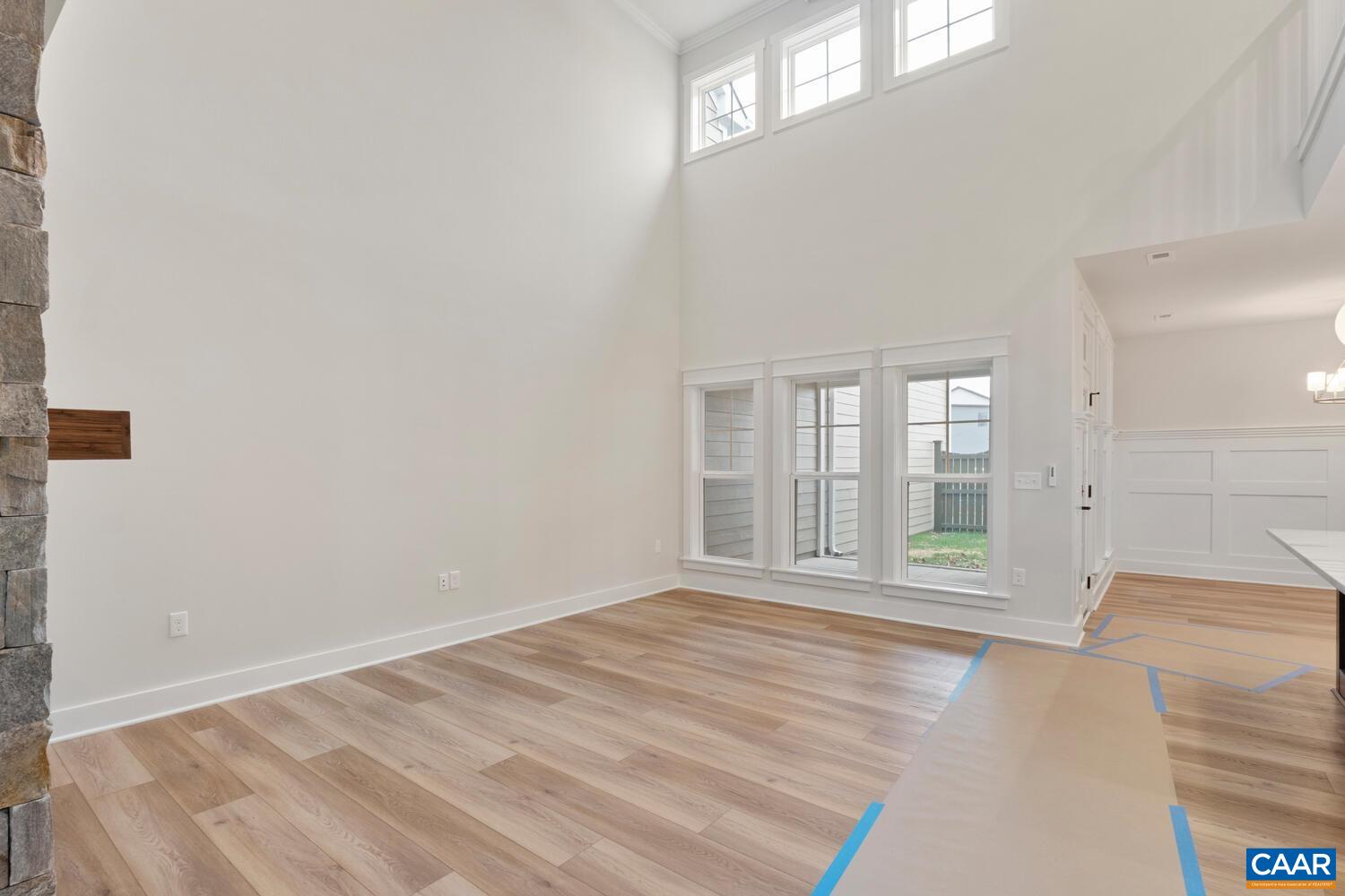935 Addle Hill Road Crozet, VA 22932 - Photo 29 of 56 a view of empty room with wooden floor and fan