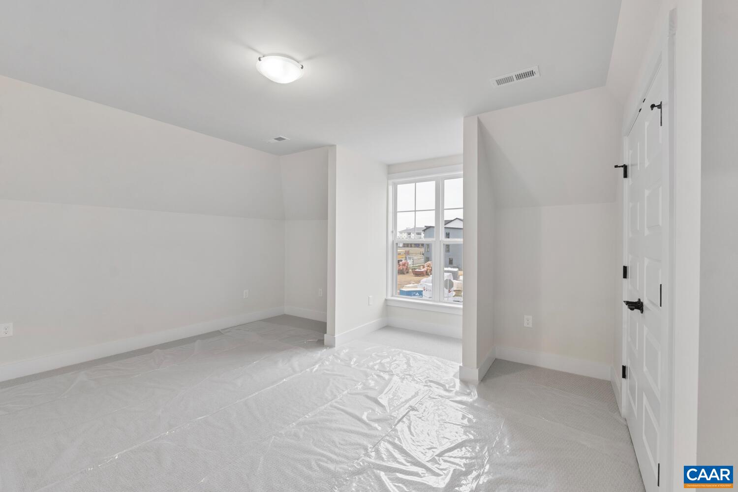 935 Addle Hill Road Crozet, VA 22932 - Photo 46 of 56 an empty room with windows and closet