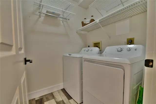 a utility room with dryer and washer