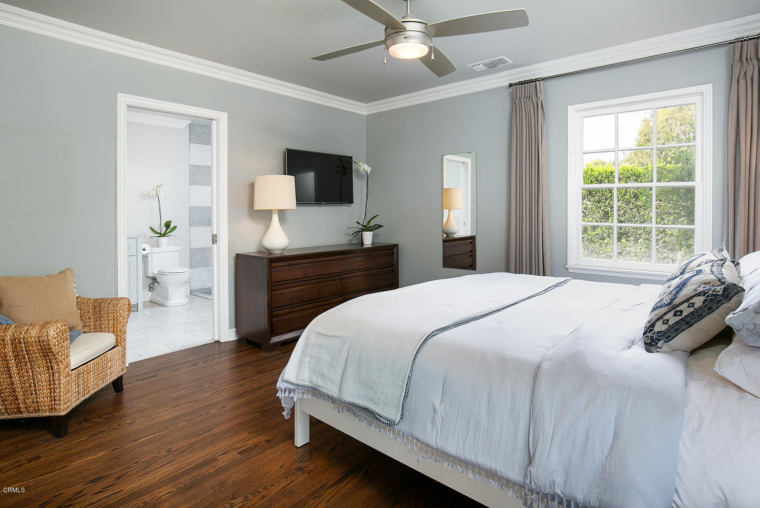 2286 Galbreth Road Pasadena, CA 91104 - Photo 15 of 25 a bedroom with a bed and wooden floor
