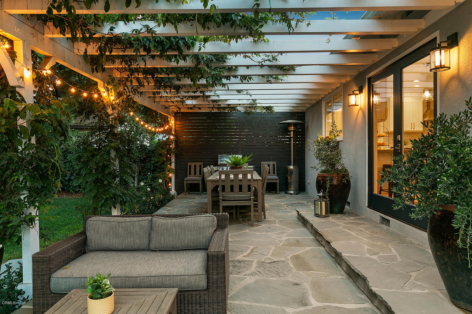 2286 Galbreth Road Pasadena, CA 91104 - Photo 21 of 25 a view of a patio with couches table and chairs and potted plants