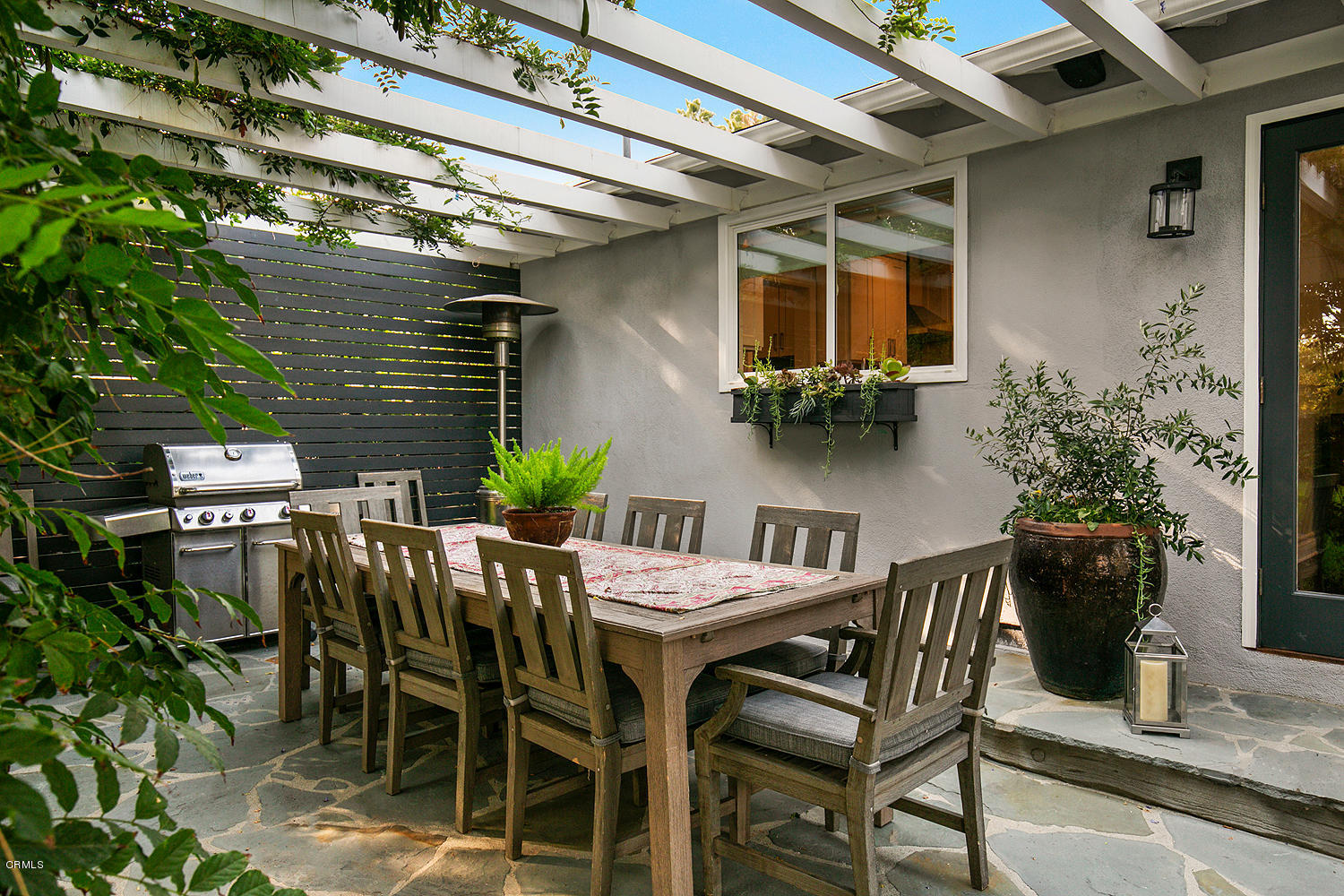 2286 Galbreth Road Pasadena, CA 91104 - Photo 22 of 25 a view of an outdoor space with a table and chairs