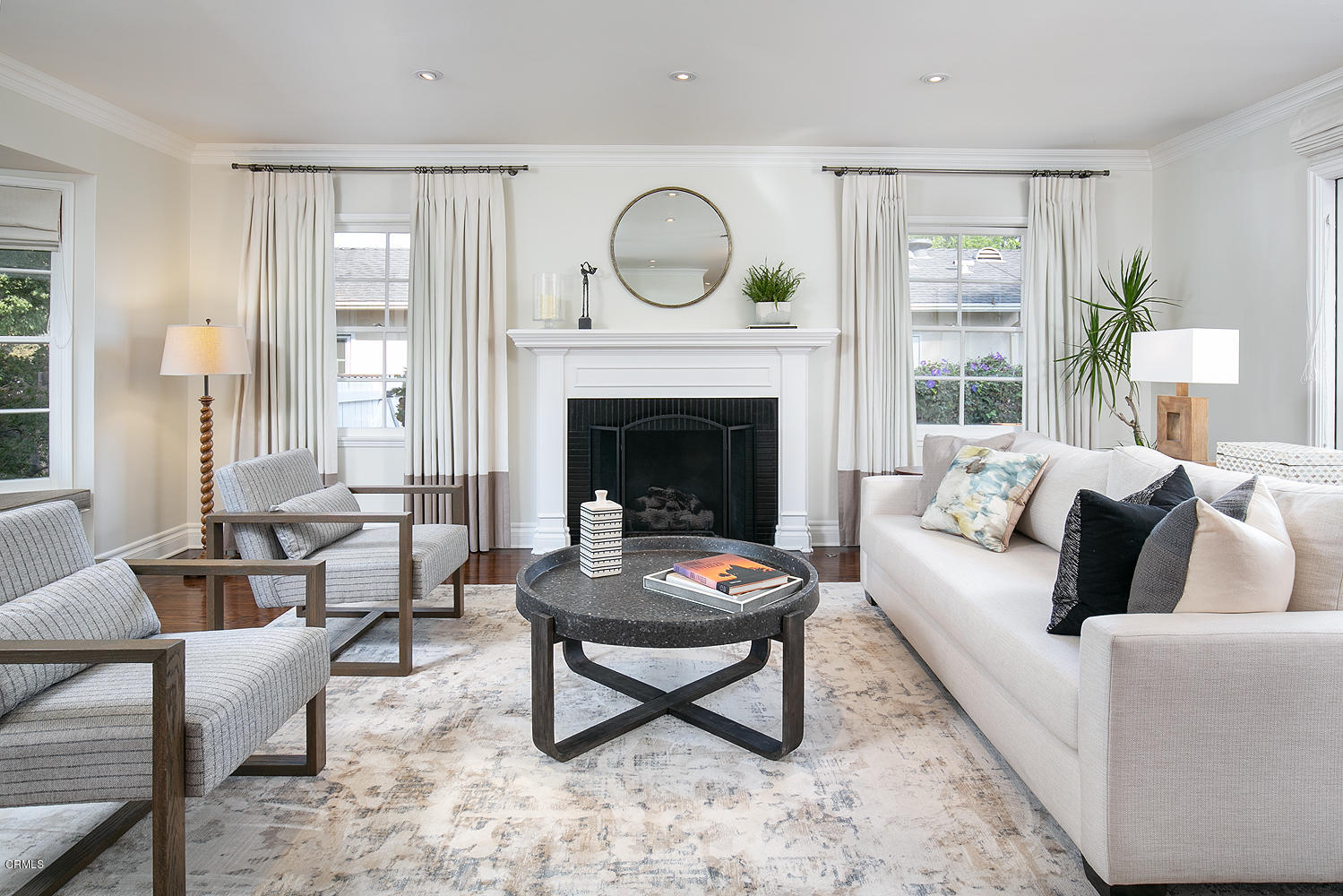2286 Galbreth Road Pasadena, CA 91104 - Photo 5 of 25 a living room with furniture and a fireplace