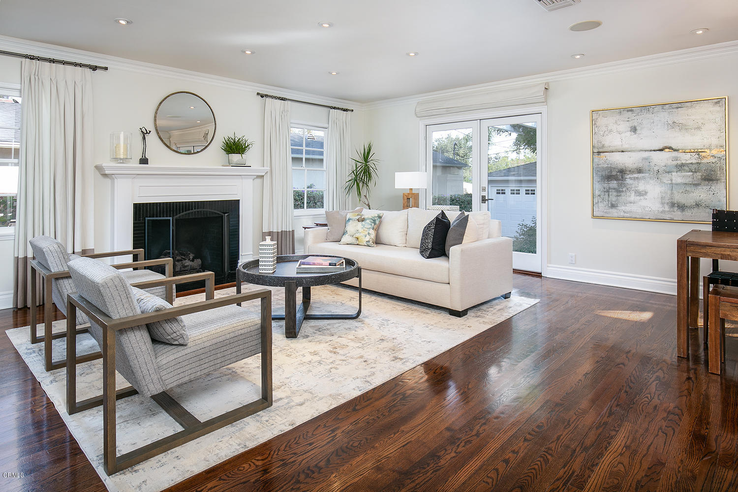 2286 Galbreth Road Pasadena, CA 91104 - Photo 6 of 25 a living room with furniture a fireplace and a large window