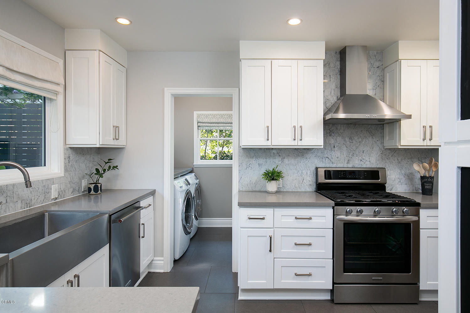 2286 Galbreth Road Pasadena, CA 91104 - Photo 9 of 25 a kitchen with stainless steel appliances granite countertop a stove a sink and a microwave