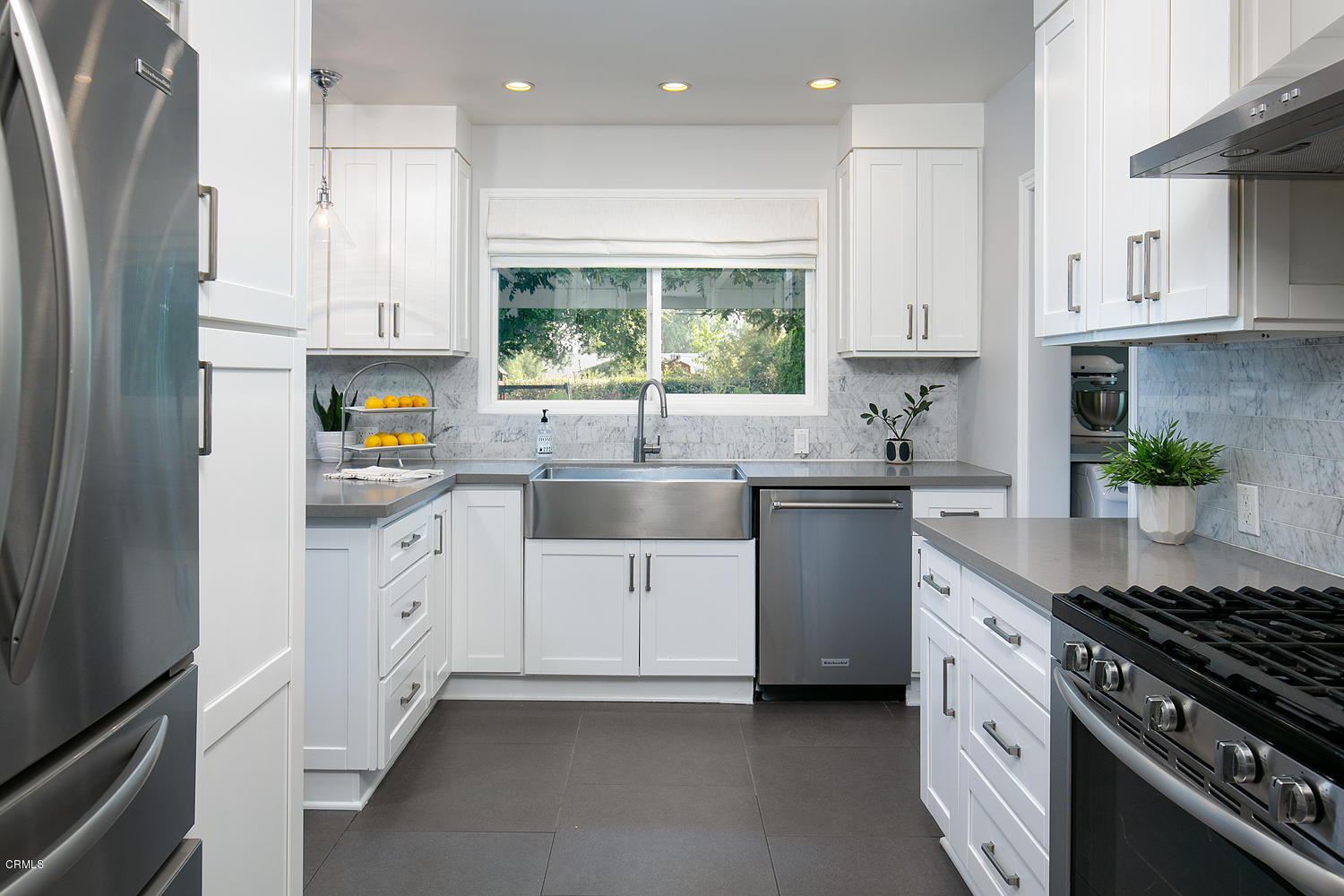 2286 Galbreth Road Pasadena, CA 91104 - Photo 10 of 25 a kitchen with white cabinets and appliances