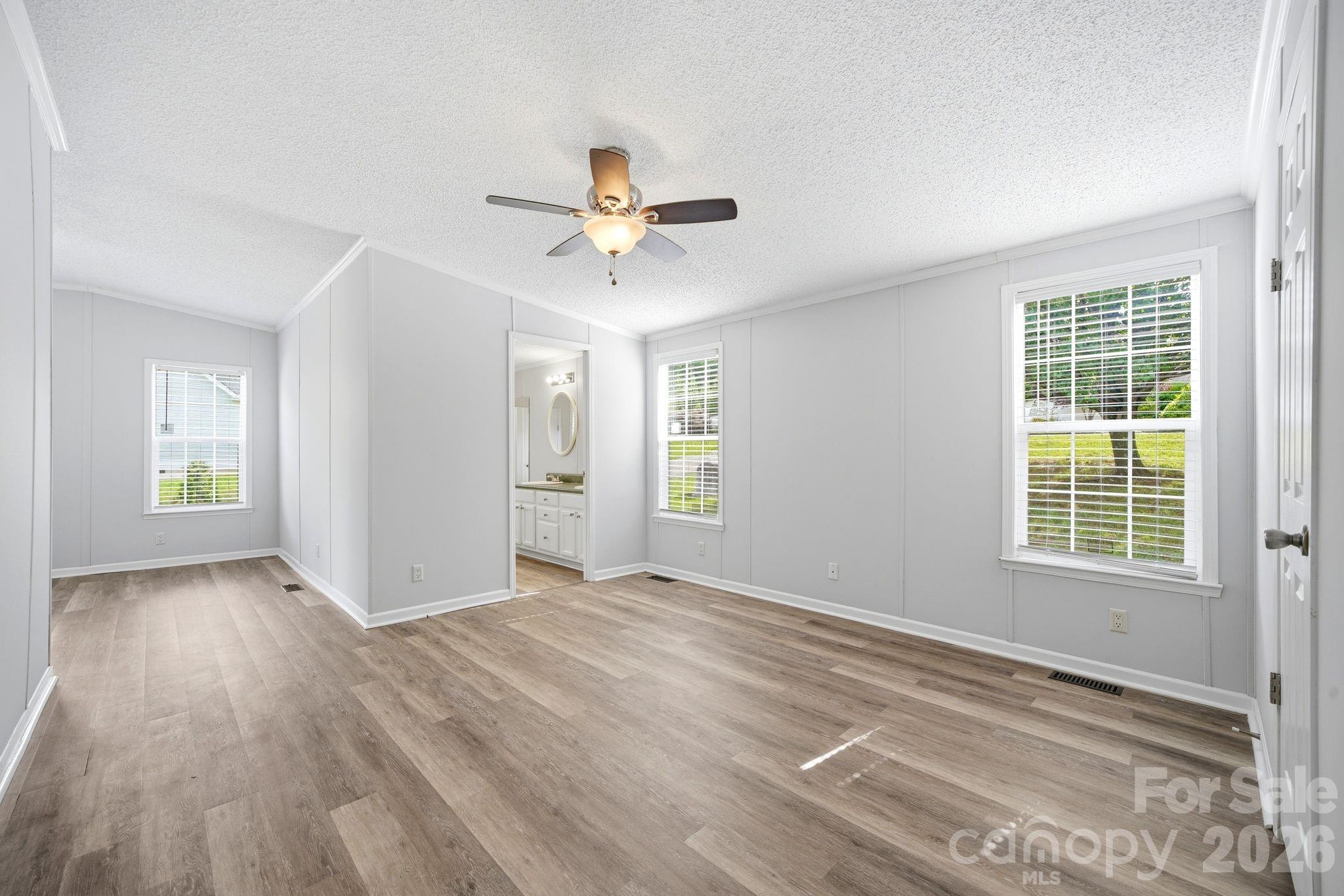 2368 Beth Haven Church Road Denver, NC 28037 - Photo 25 of 42 wooden floor in an empty room with a window