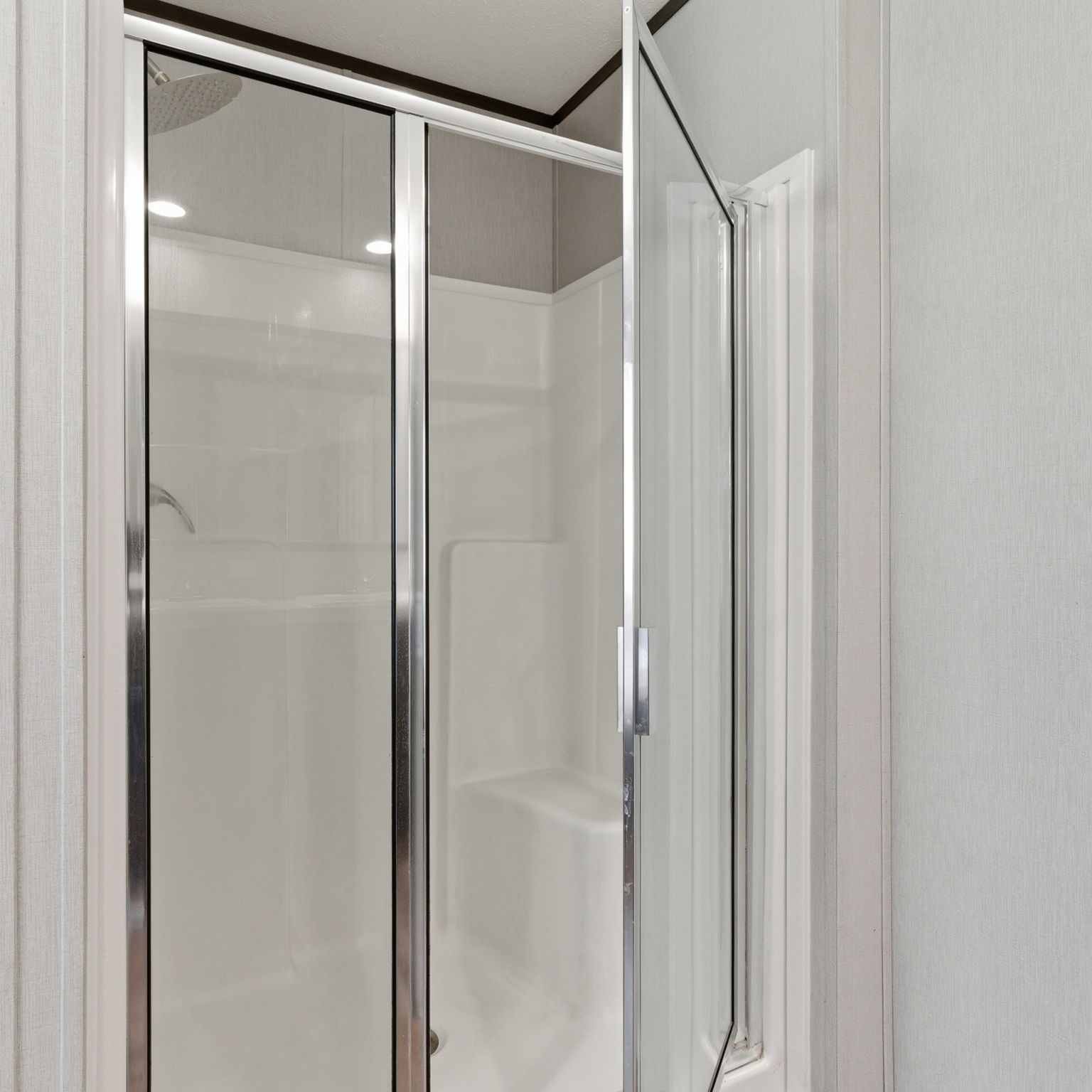 3110 Green Forest Road Conroe, TX 77303 - Photo 16 of 50 a bathroom with a glass shower door