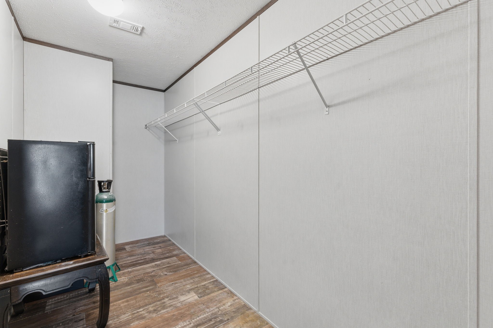 3110 Green Forest Road Conroe, TX 77303 - Photo 17 of 50 a view of a room with wooden floor