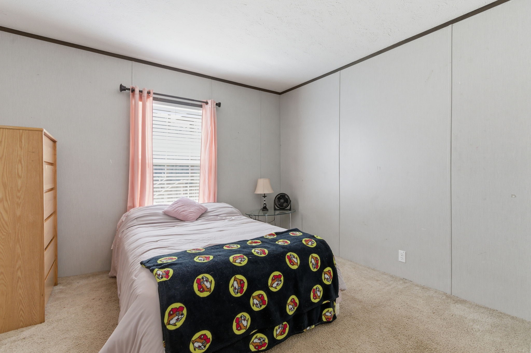 3110 Green Forest Road Conroe, TX 77303 - Photo 19 of 50 a bedroom with a bed and a cabinets
