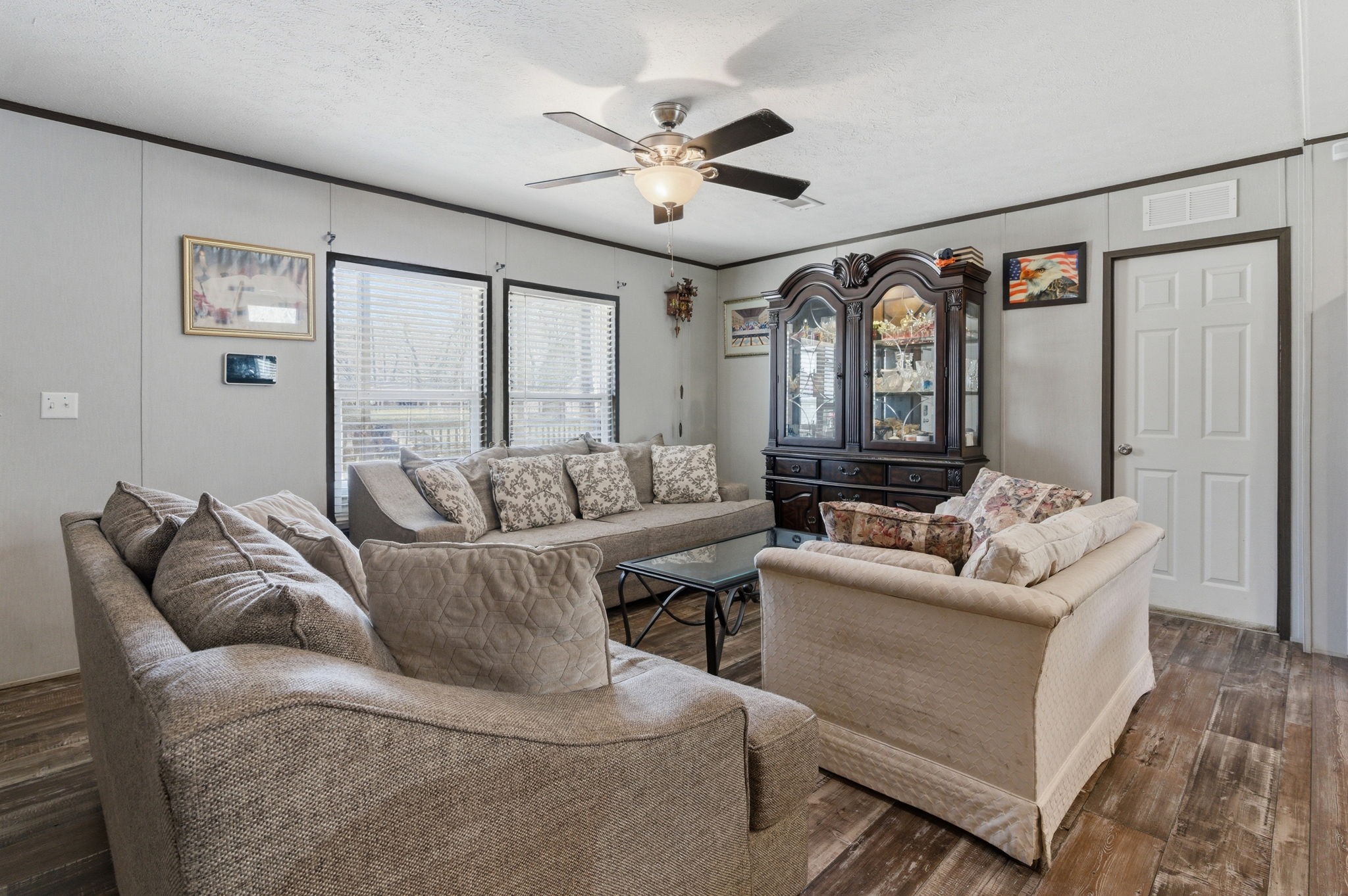 3110 Green Forest Road Conroe, TX 77303 - Photo 2 of 50 a living room with furniture and a large window