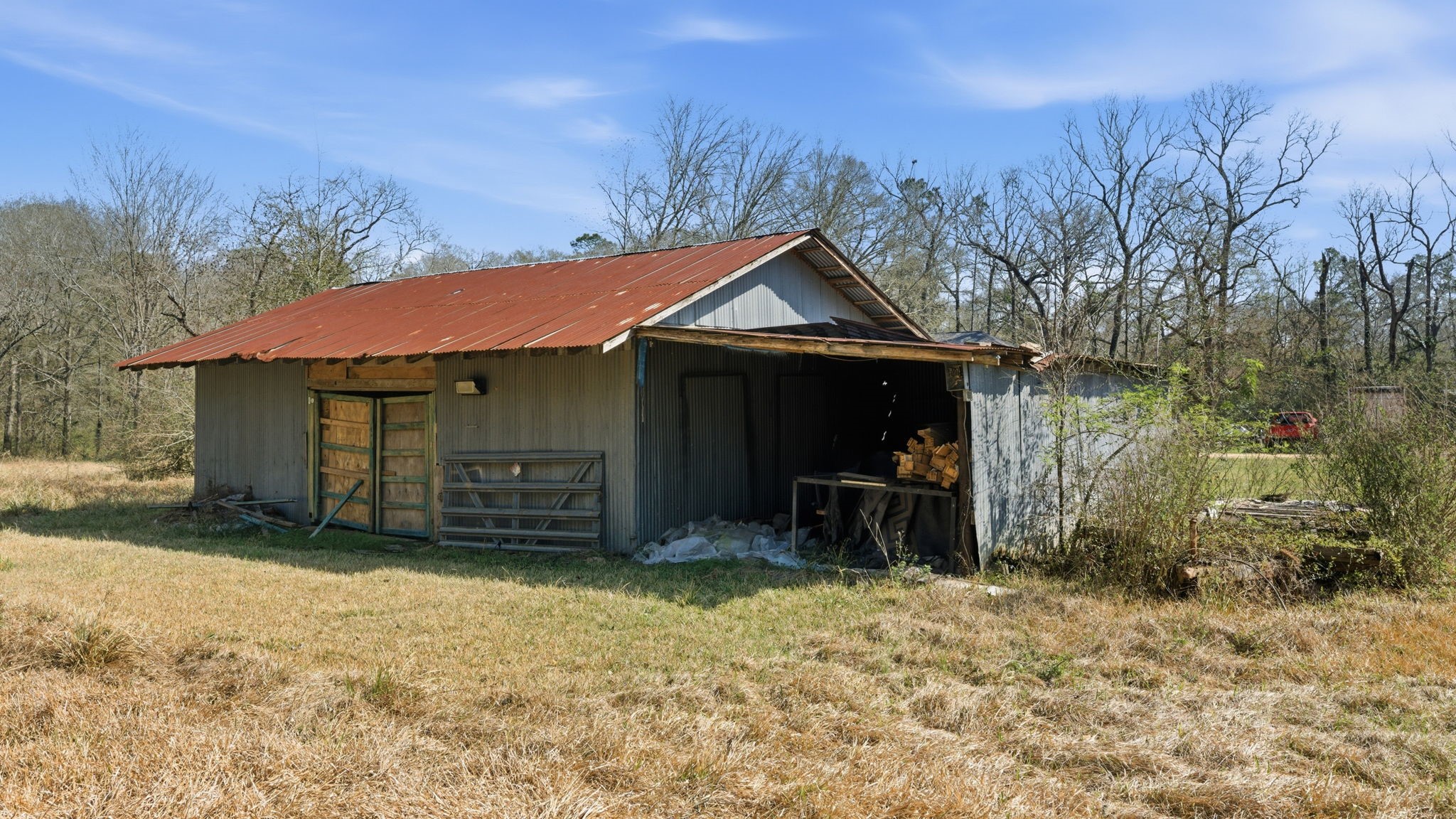 3110 Green Forest Road Conroe, TX 77303 - Photo 27 of 50 a front view of a house with a yard and garage