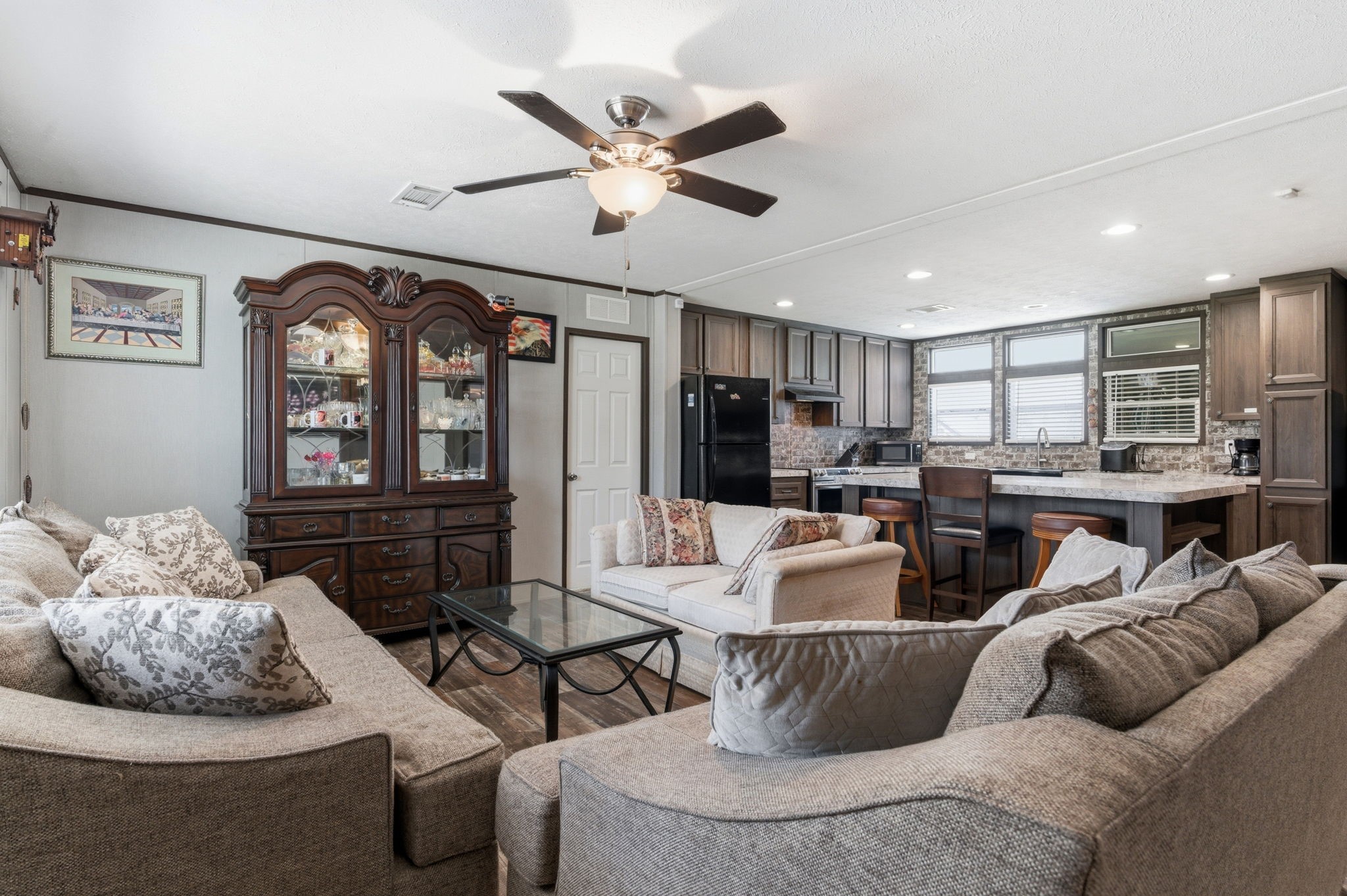3110 Green Forest Road Conroe, TX 77303 - Photo 3 of 50 a living room with furniture and kitchen view