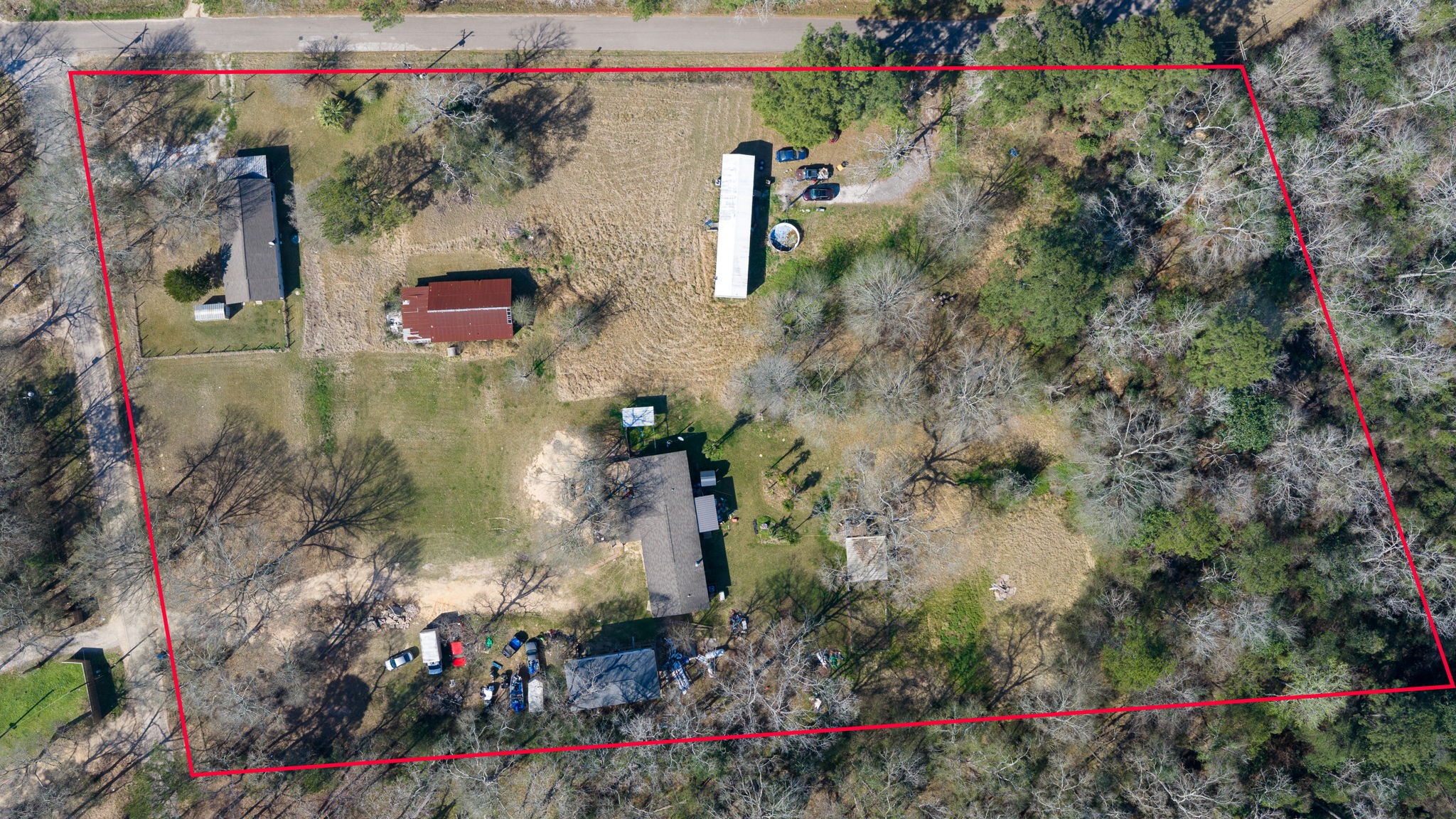 3110 Green Forest Road Conroe, TX 77303 - Photo 34 of 50 an aerial view of residential house with outdoor space
