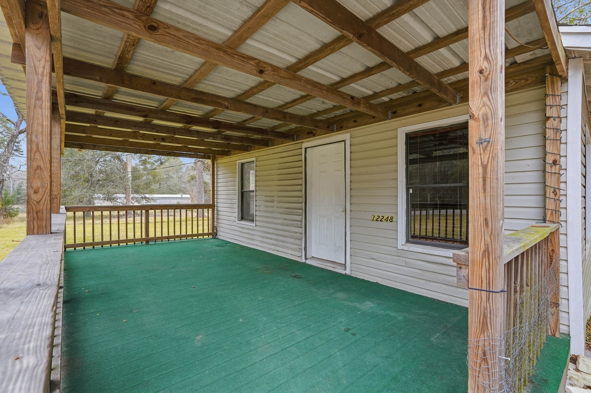 3110 Green Forest Road Conroe, TX 77303 - Photo 37 of 50 a view of a backyard of the house