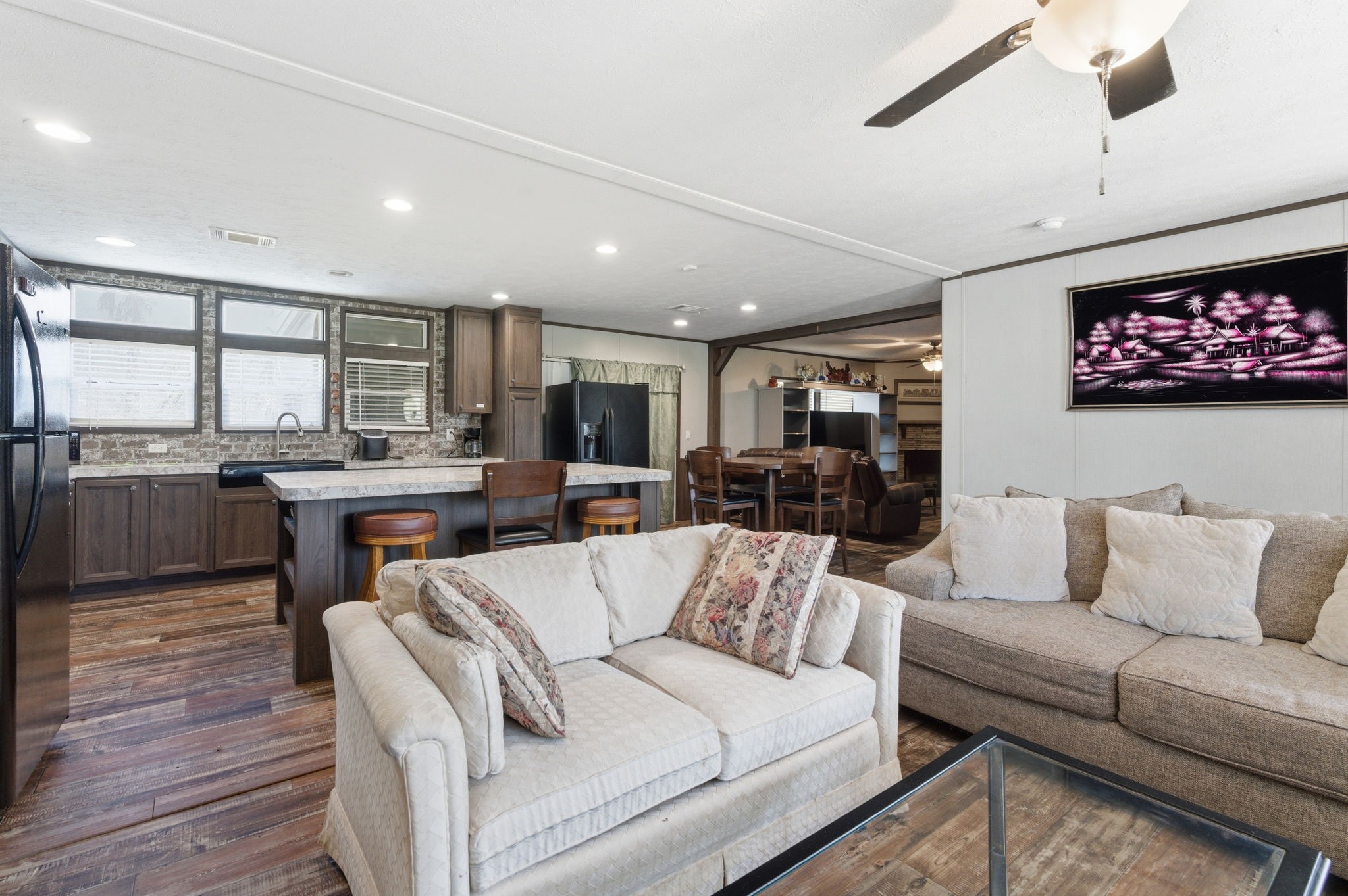3110 Green Forest Road Conroe, TX 77303 - Photo 5 of 50 a living room with furniture kitchen view and a large window