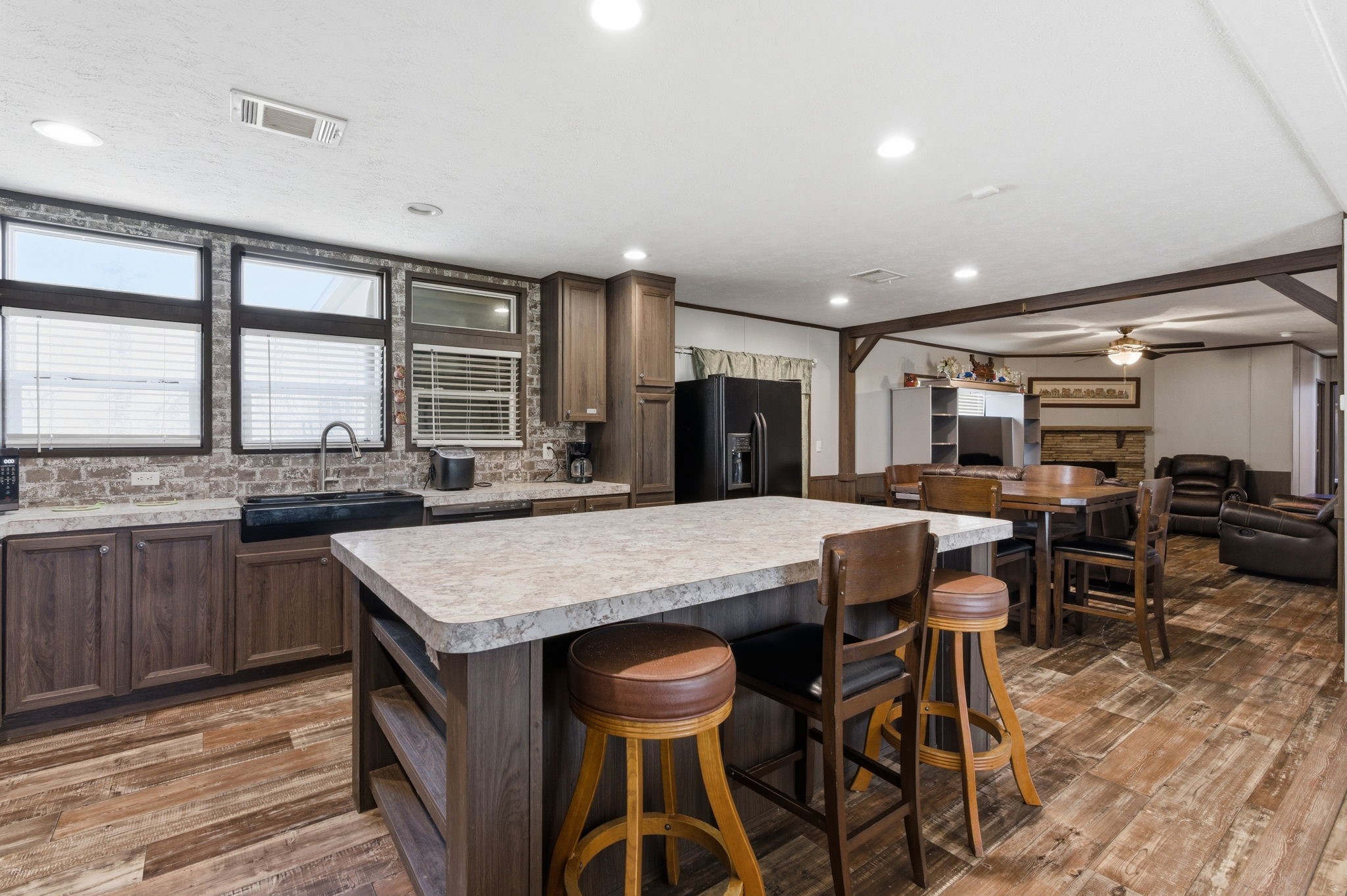 3110 Green Forest Road Conroe, TX 77303 - Photo 9 of 50 a kitchen with a table and chairs in it