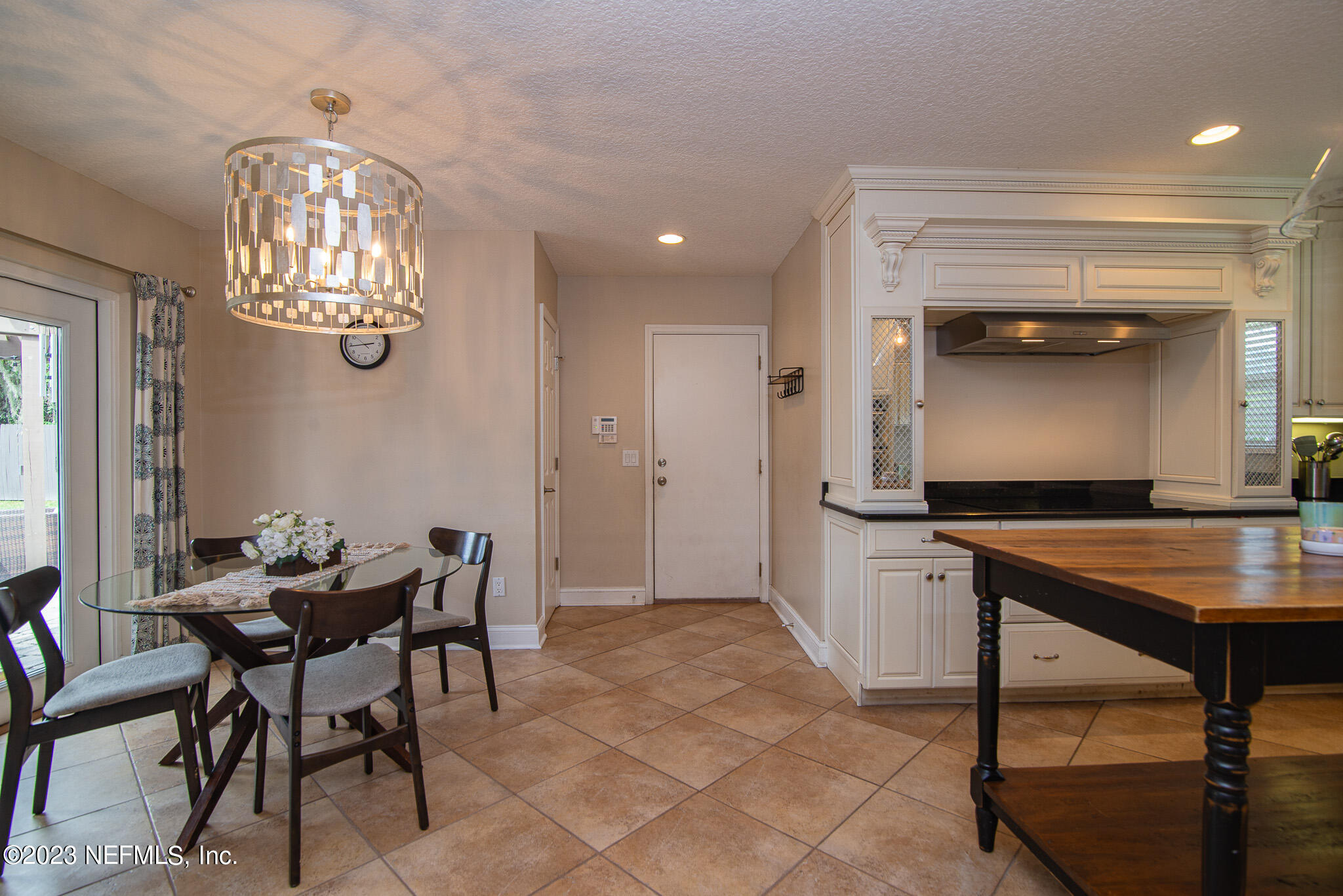9409 Woodhaven Road Jacksonville, FL 32257 - Photo 15 of 38 a view of a dining room with furniture