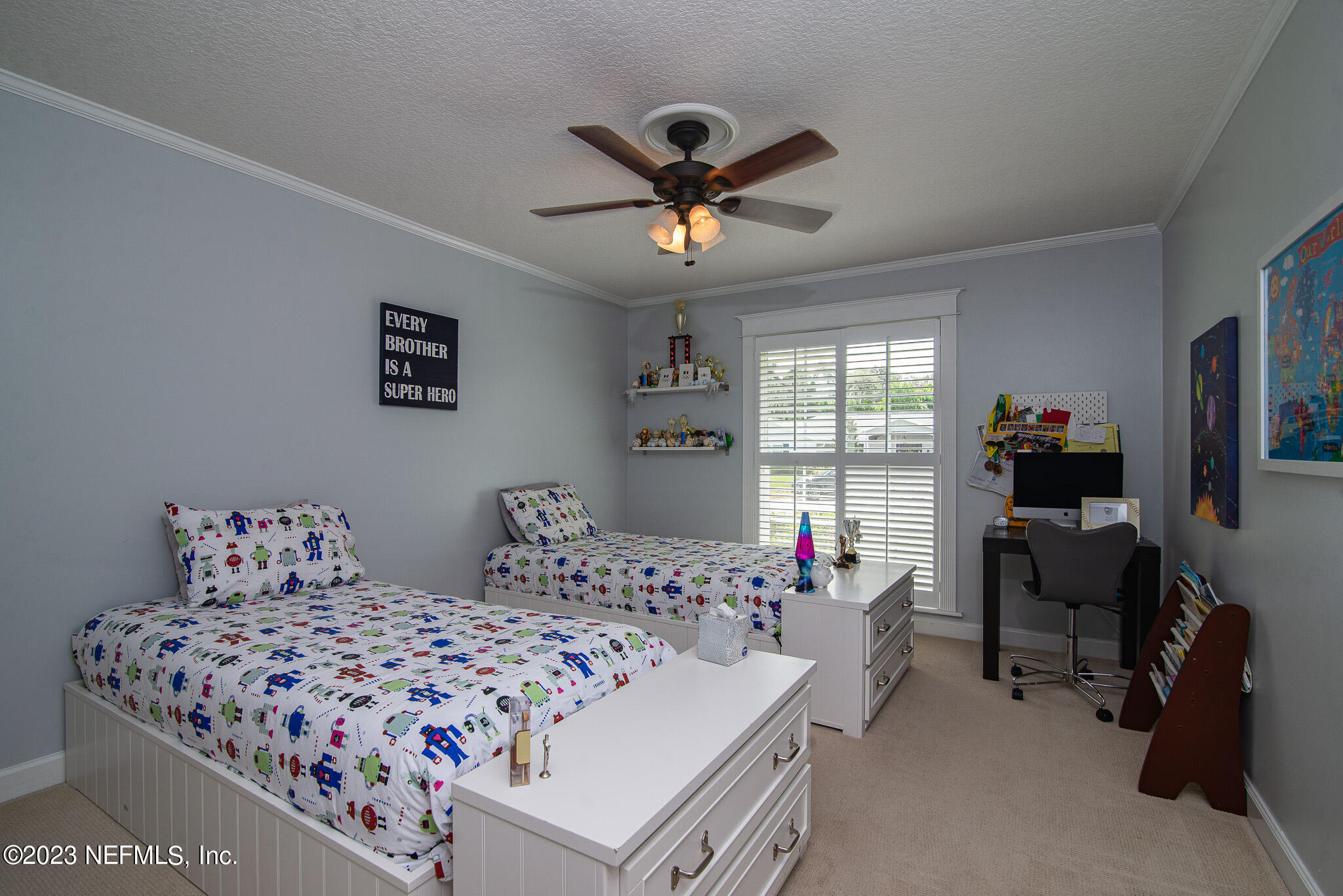 9409 Woodhaven Road Jacksonville, FL 32257 - Photo 23 of 38 a bedroom with bed and a window