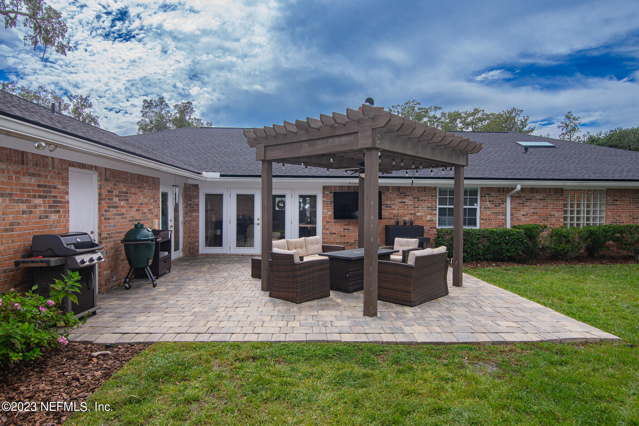 9409 Woodhaven Road Jacksonville, FL 32257 - Photo 34 of 38 a front view of house with yard and outdoor seating