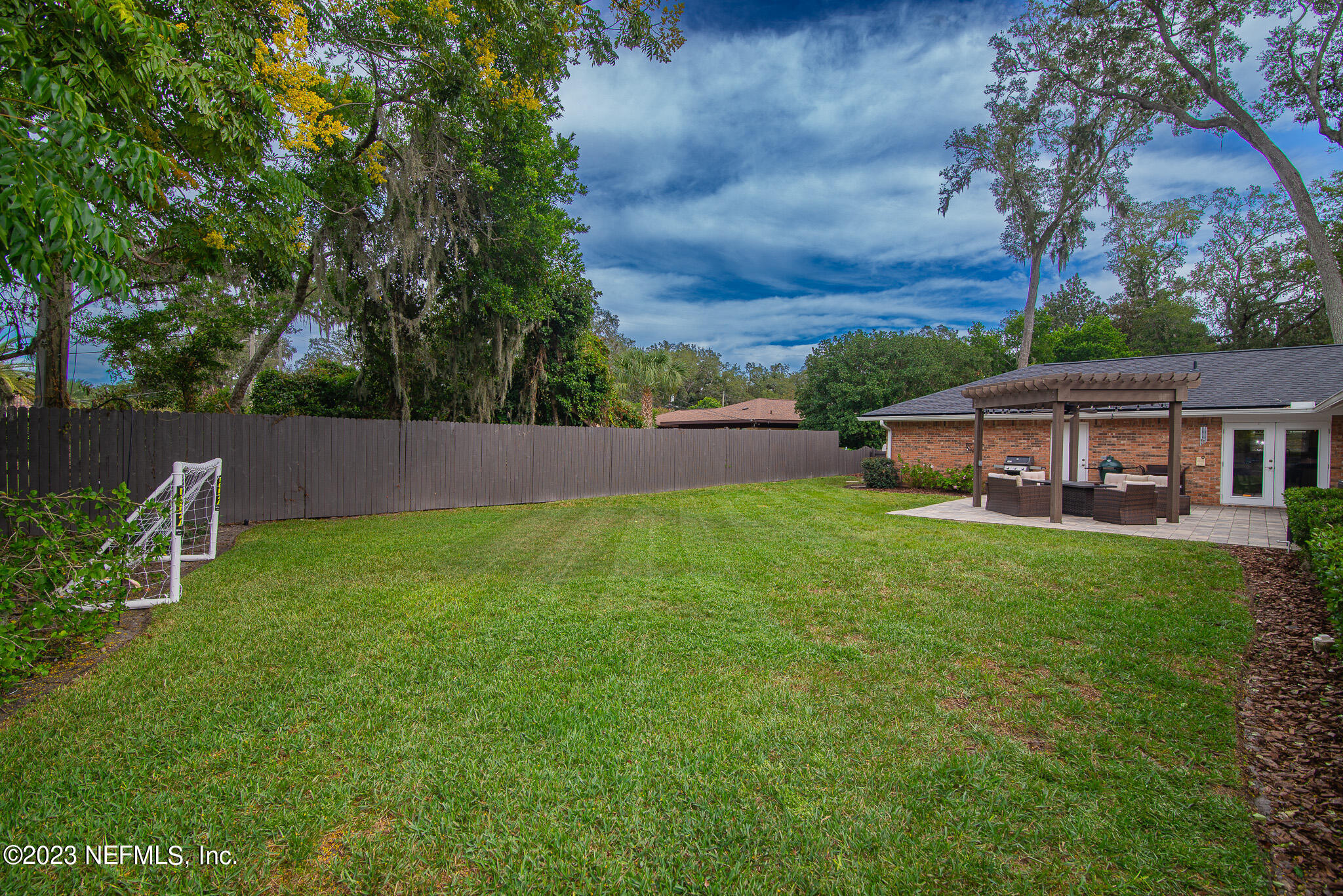 9409 Woodhaven Road Jacksonville, FL 32257 - Photo 37 of 38 a view of house with backyard