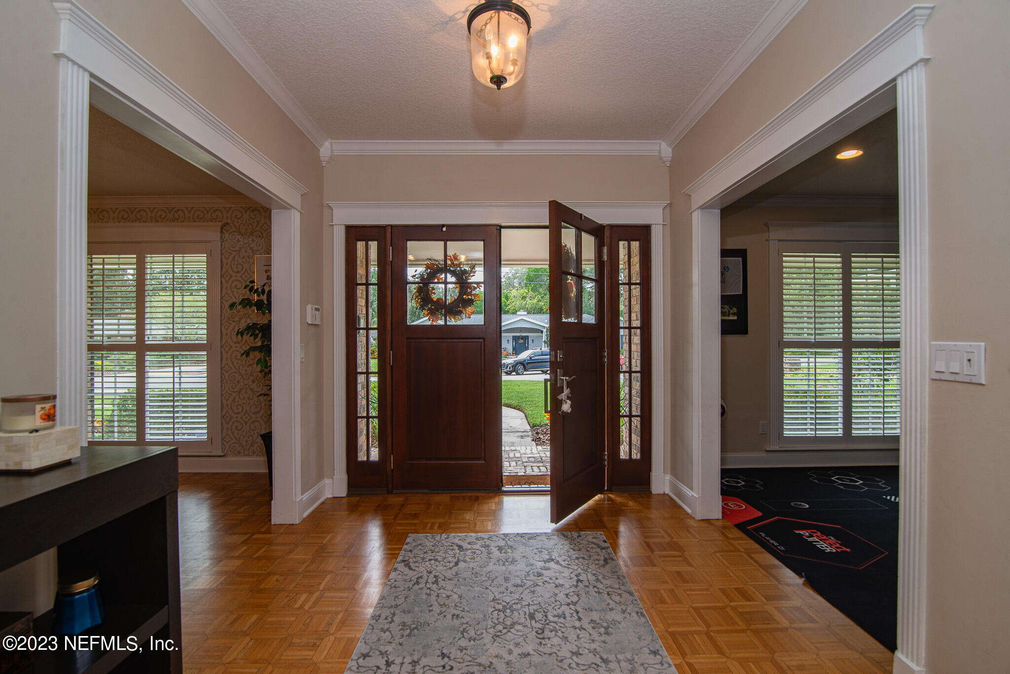 9409 Woodhaven Road Jacksonville, FL 32257 - Photo 4 of 38 a view of an entryway with a livingroom