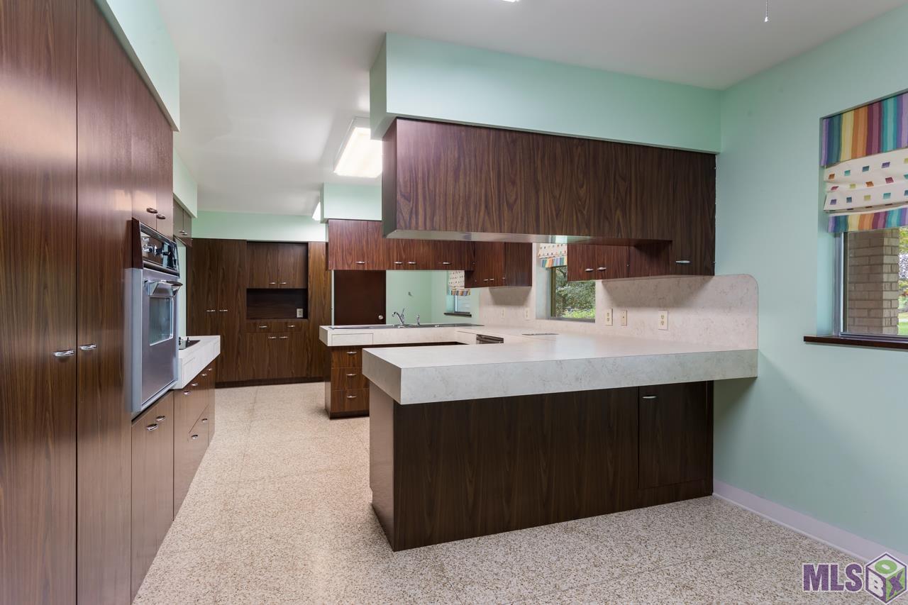 22475 Hoo Shoo Too Road Baton Rouge, LA 70817 - Photo 20 of 32 Two Breakfast Bars and Plenty of Storage & Counter Space