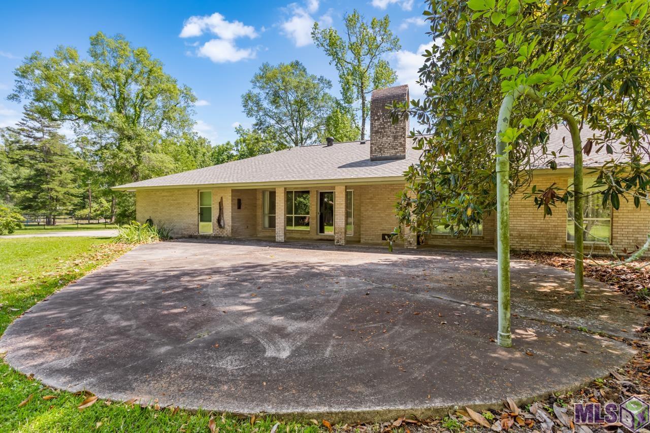 22475 Hoo Shoo Too Road Baton Rouge, LA 70817 - Photo 29 of 32 Rear Covered Patio and Extended Open Patio
