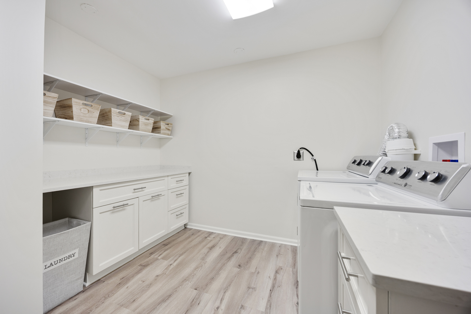 1401 Burr Oak Road, Unit 117B Hinsdale, IL 60521 - Photo 15 of 26 a utility room with sink dryer and washer