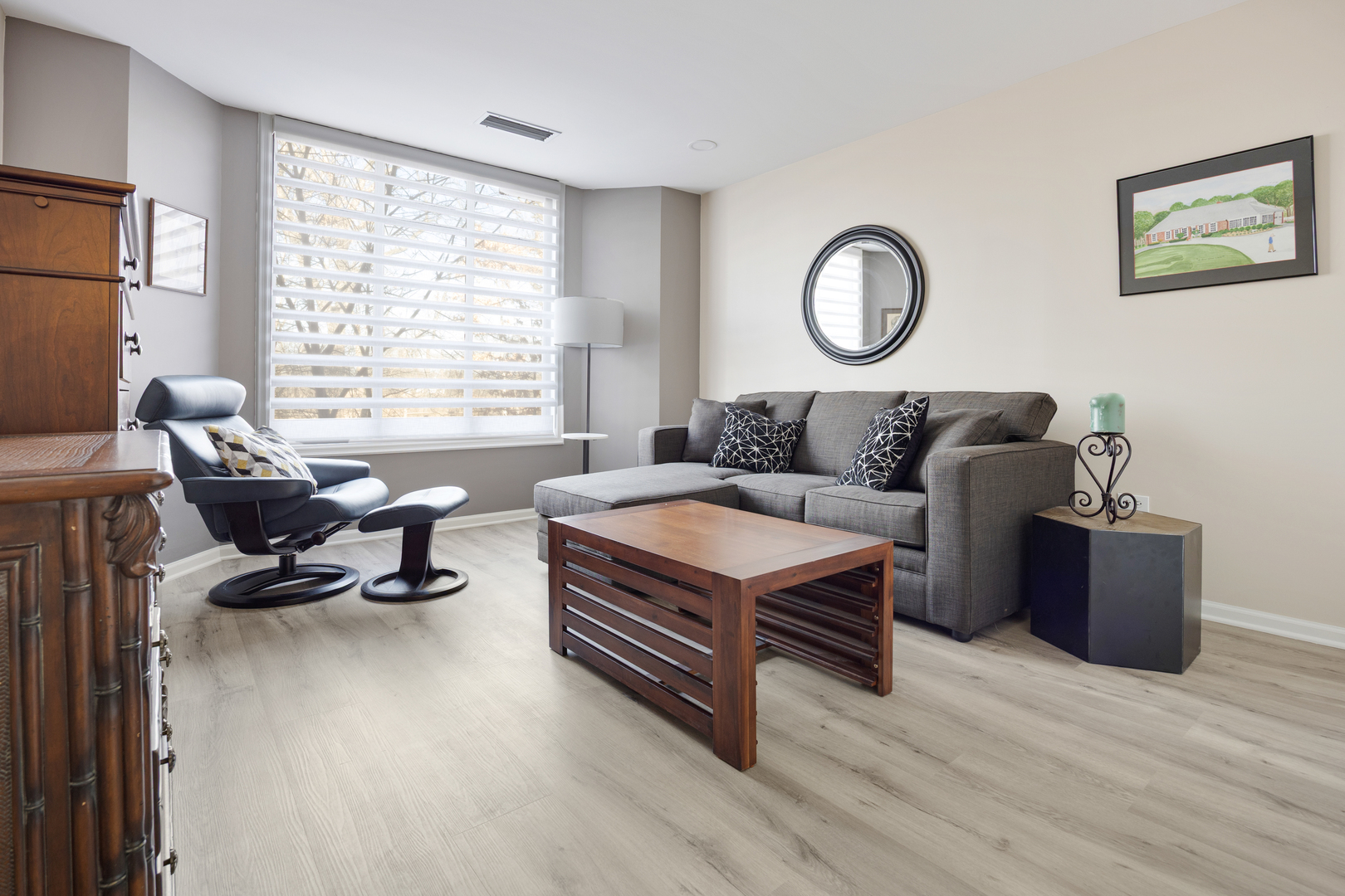 1401 Burr Oak Road, Unit 117B Hinsdale, IL 60521 - Photo 16 of 26 a living room with furniture a bed and a window
