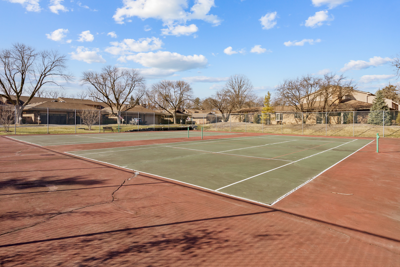 1401 Burr Oak Road, Unit 117B Hinsdale, IL 60521 - Photo 24 of 26 a view of an outdoor space and tennis court