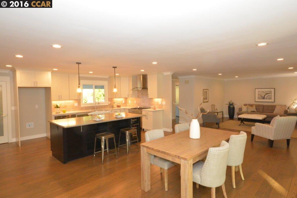 112 Ardith Drive Orinda, CA 94563 - Photo 1 of 1 a kitchen with a table and chairs in it