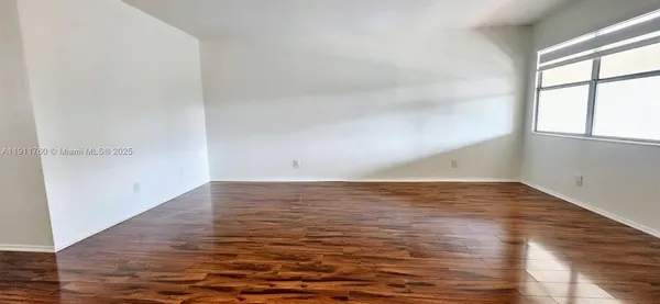 a view of an ocean & window in a room