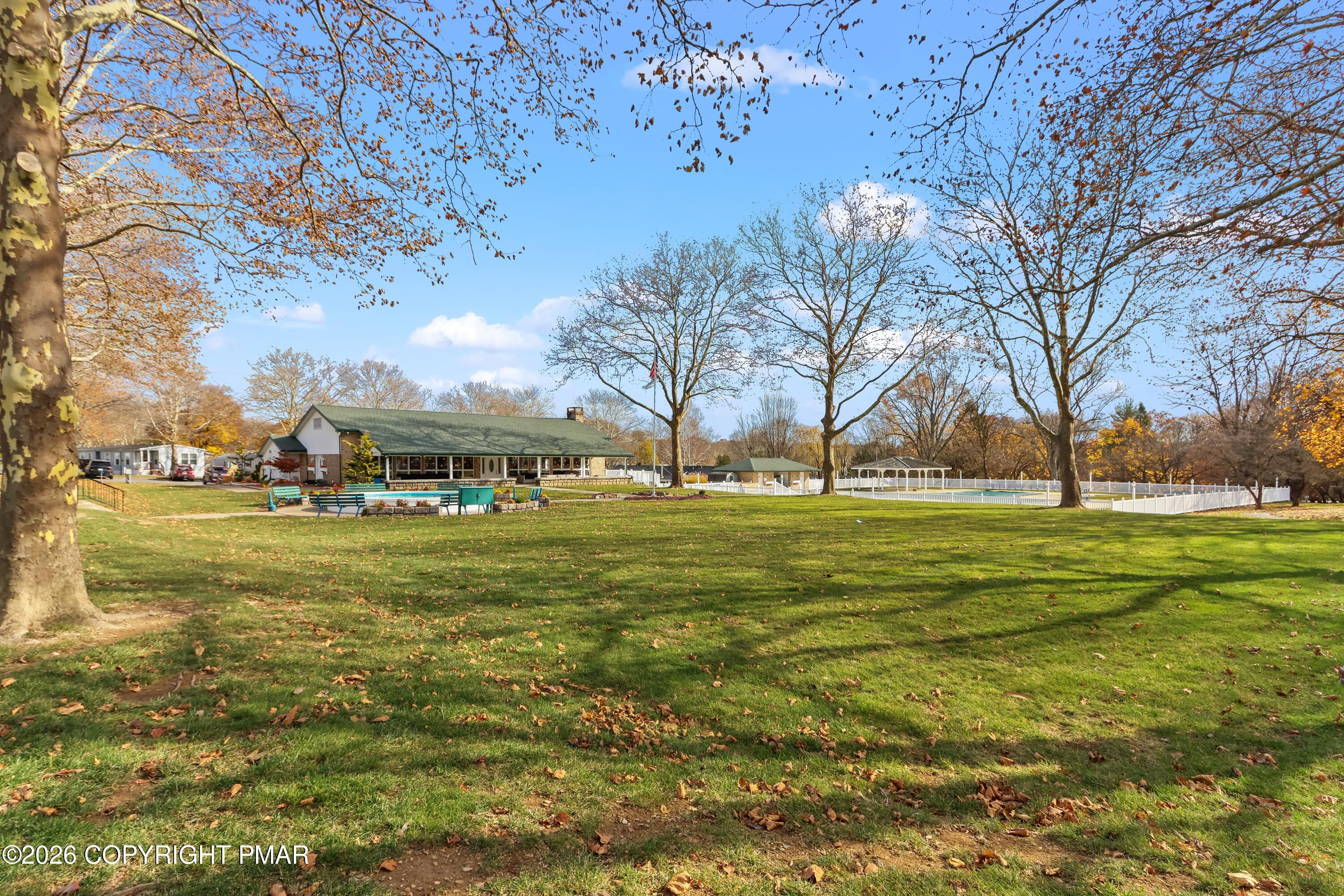 17 Valley View Drive Bath, PA 18014 - Photo 29 of 34 a view of swimming pool with outdoor seating and trees in the background