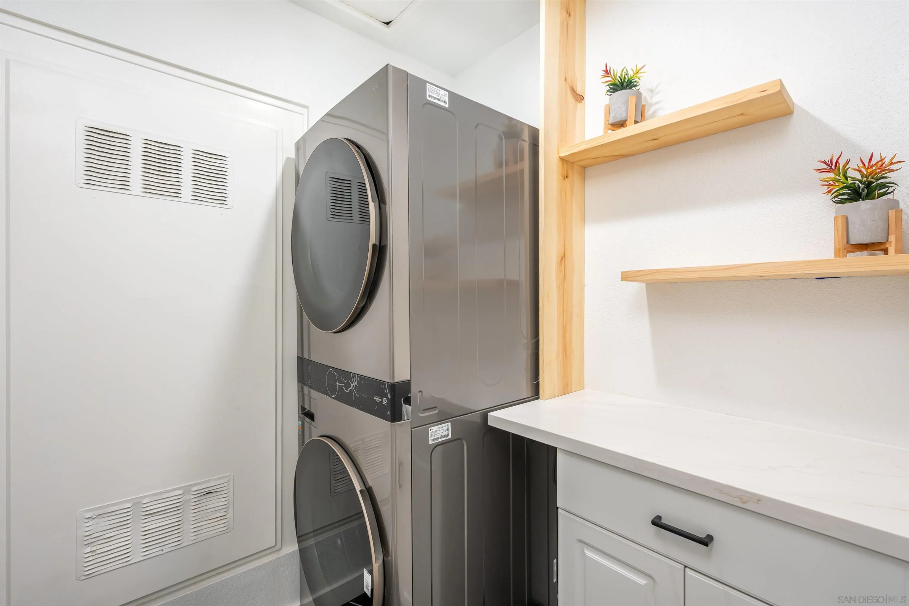 3577 Guava Way Oceanside, CA 92058 - Photo 15 of 42 a utility room with dryer and washer