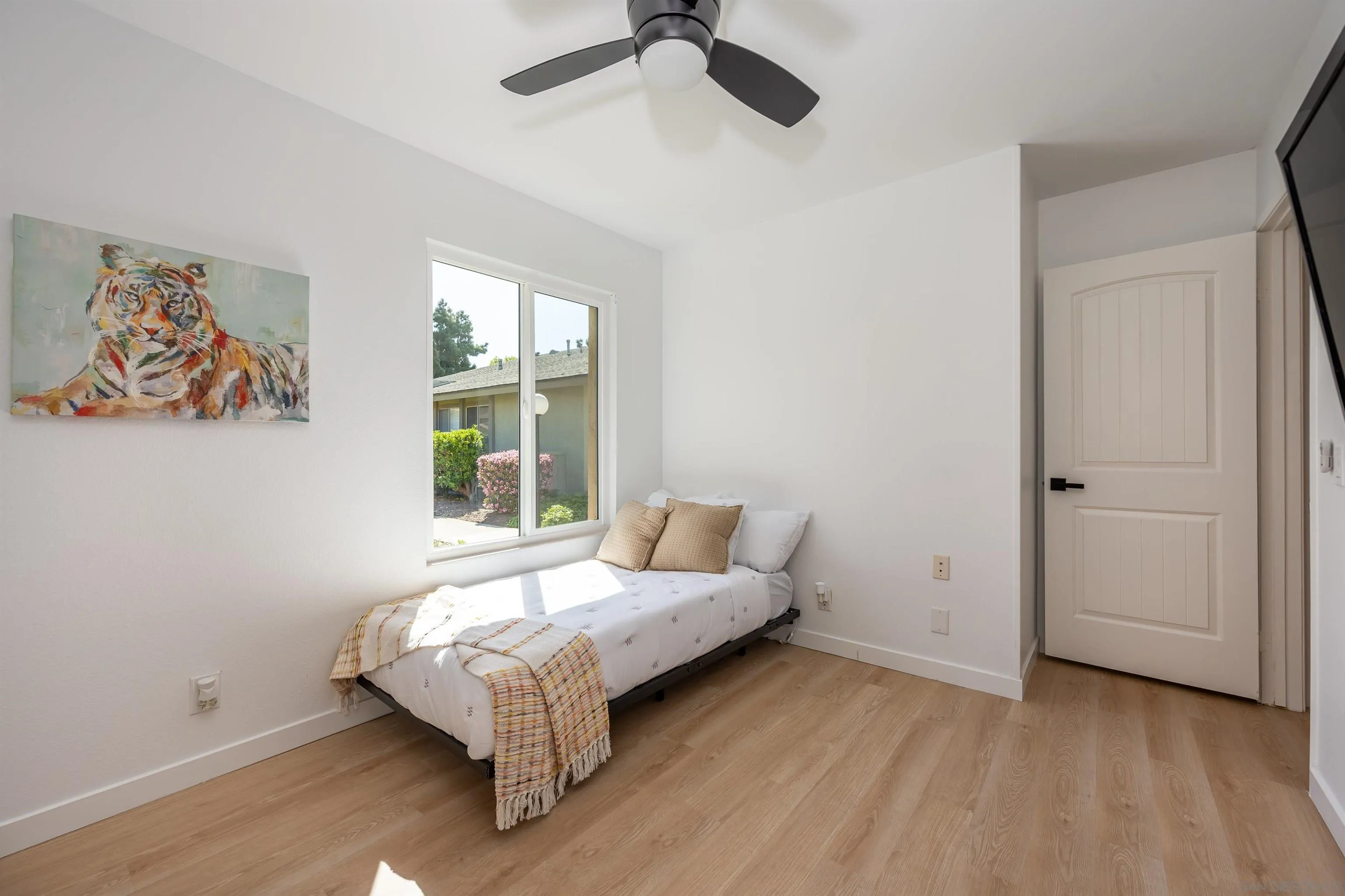 3577 Guava Way Oceanside, CA 92058 - Photo 25 of 42 a bed room with a bed and a window